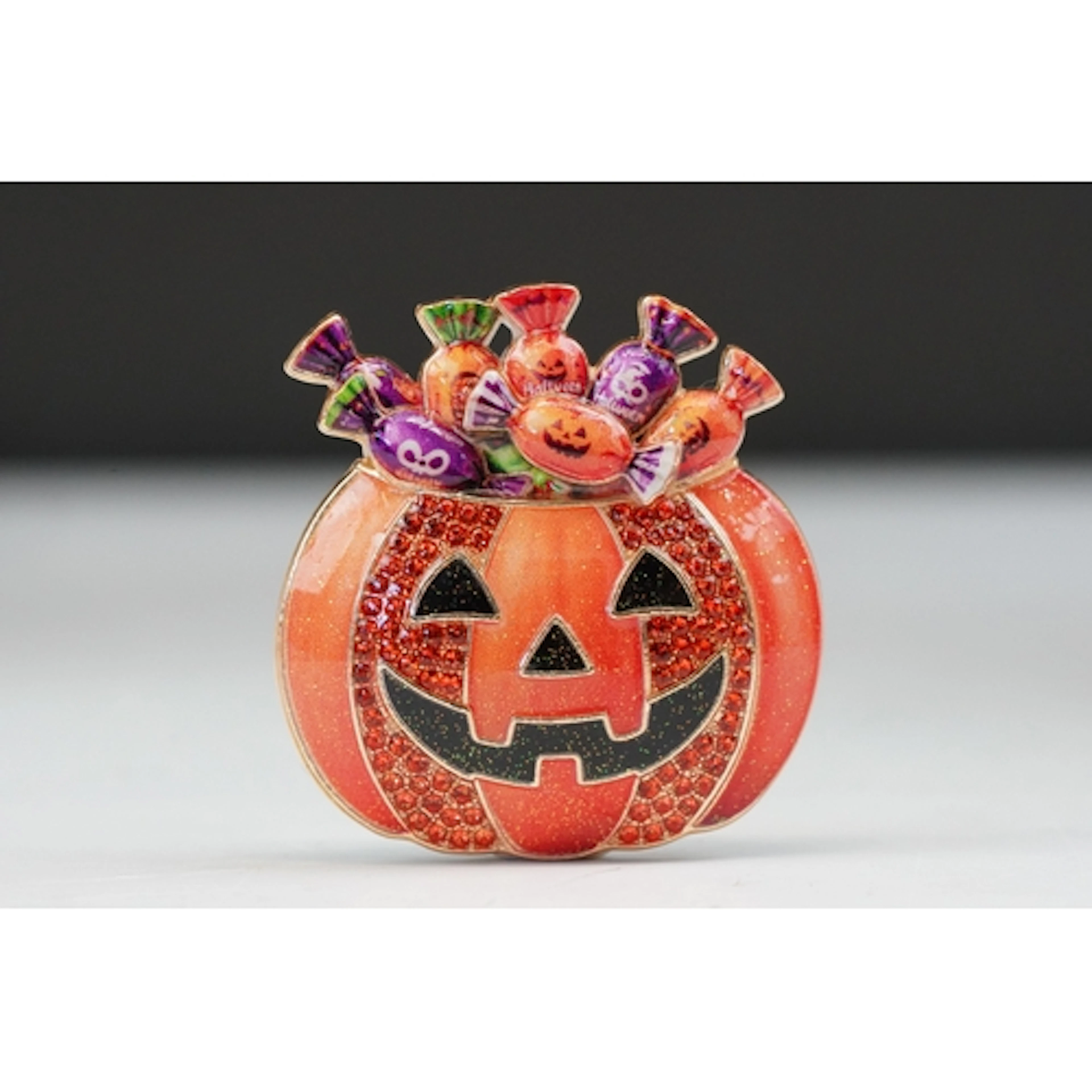 A contemporary gold tone Halloween brooch in the form of a P...