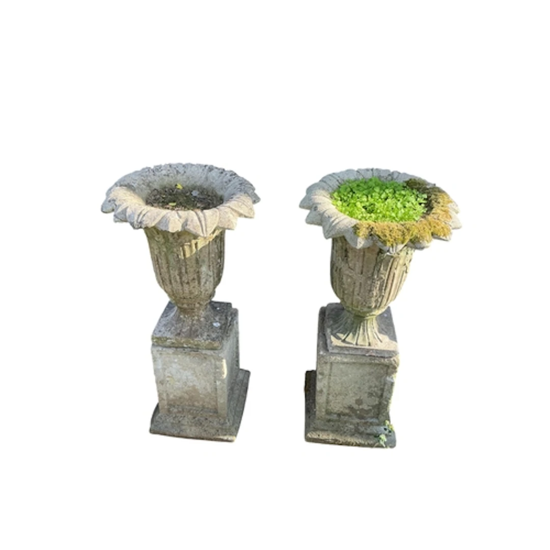 A pair of reconstituted stone campana garden urns on square ...