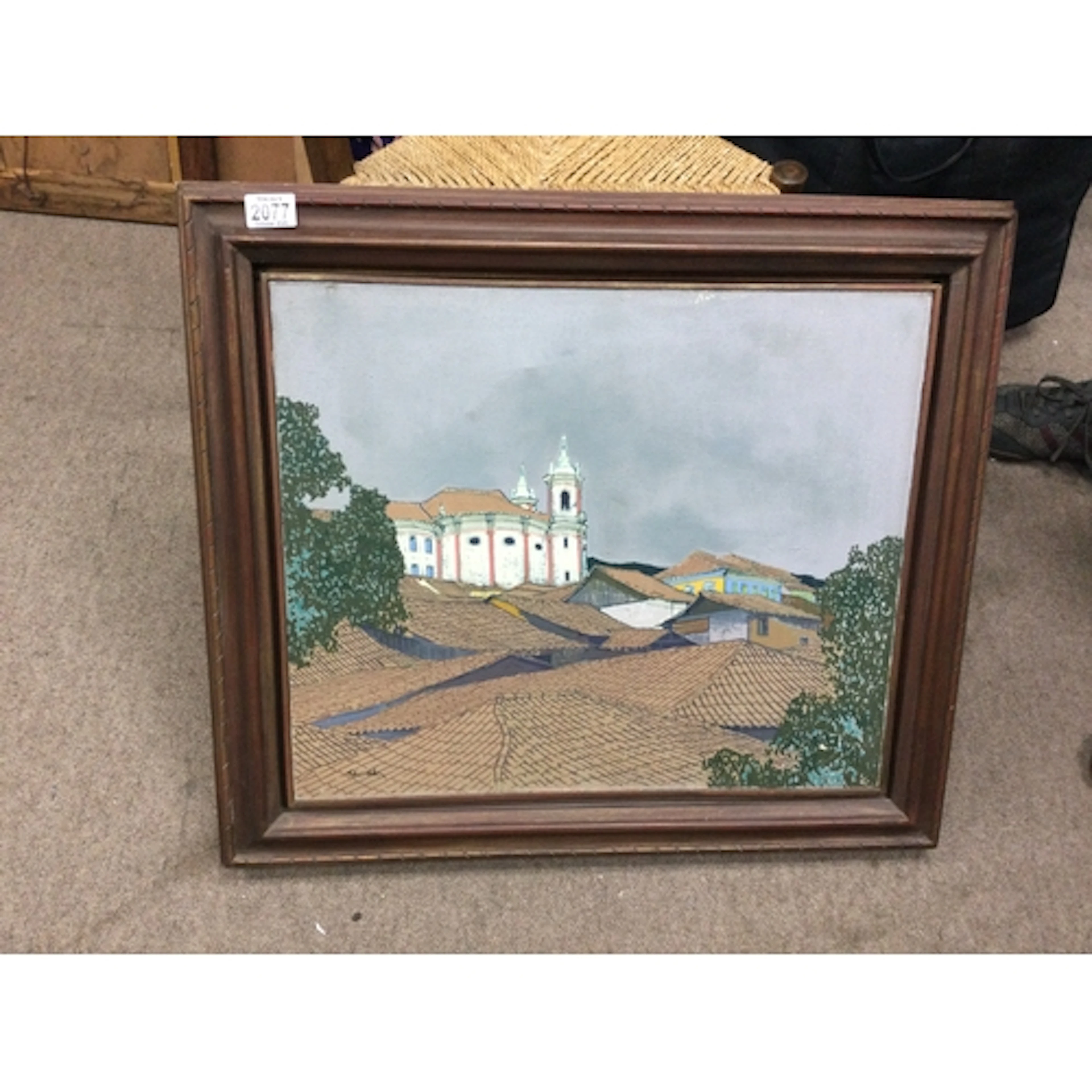A landscape painting depicting the historic rooftops and chu...
