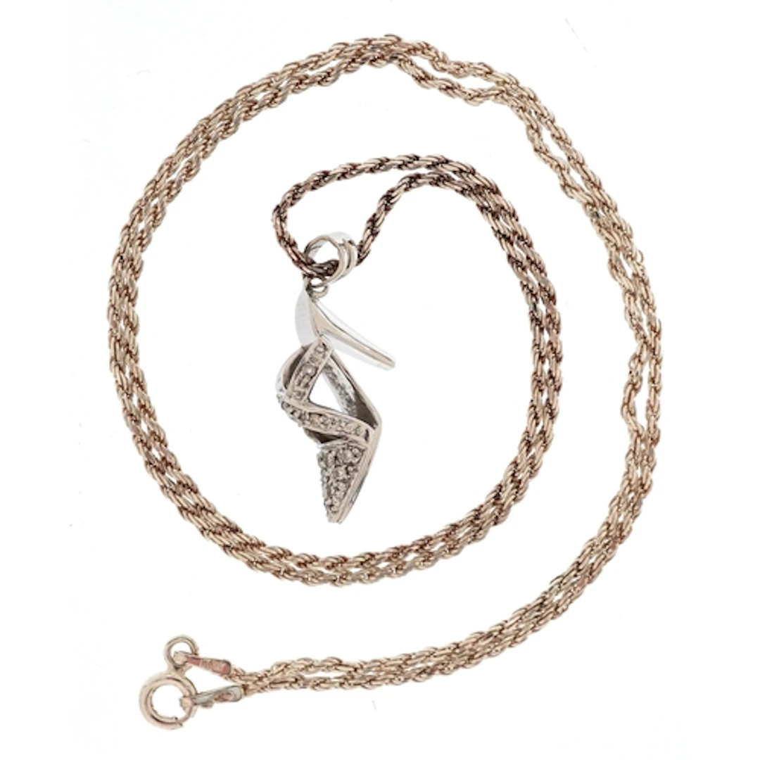 18ct white gold diamond high heeled shoe pendant on a silver...