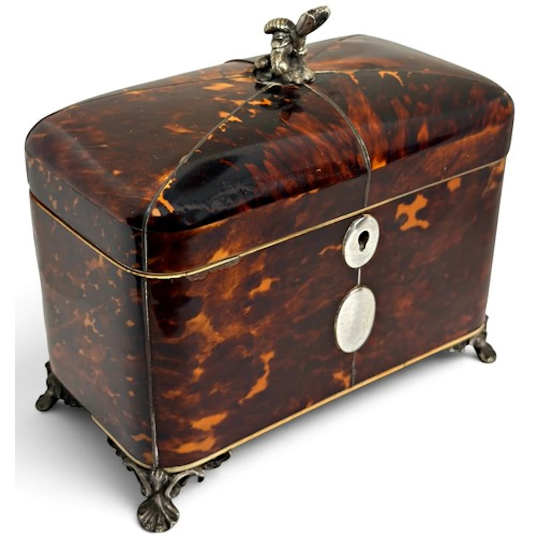 A 19th century tortoiseshell tea caddy of rounded rectangula...