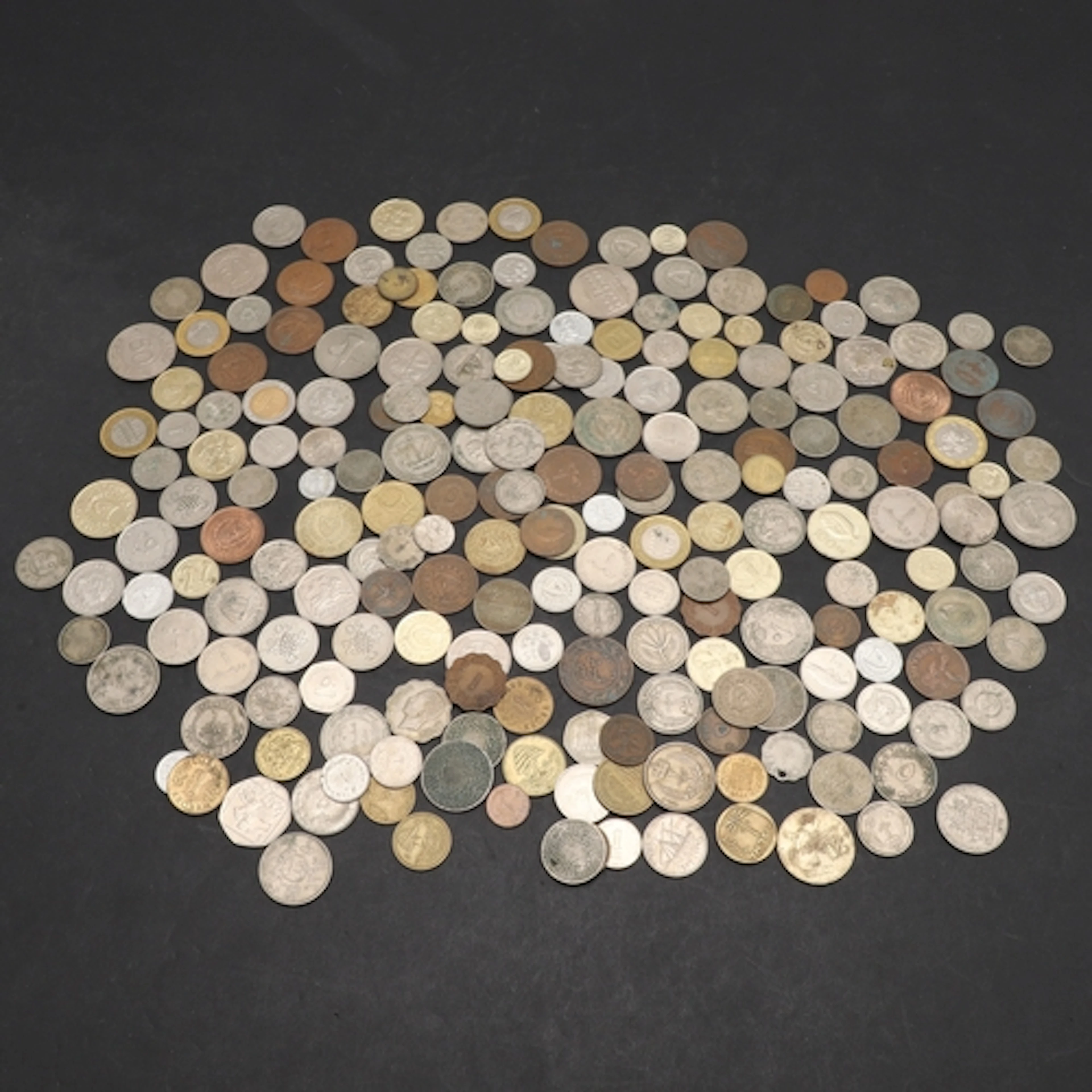 WORLD COINS: A COLLECTION OF COINS FROM DIVERSE COUNTRIES IN...