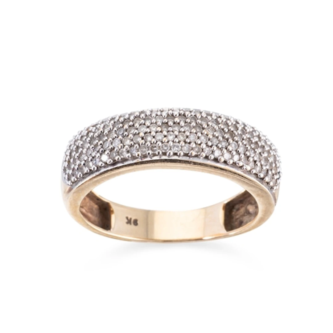 A DIAMOND BAND RING, the pavé set diamonds mounted in 9ct ye...