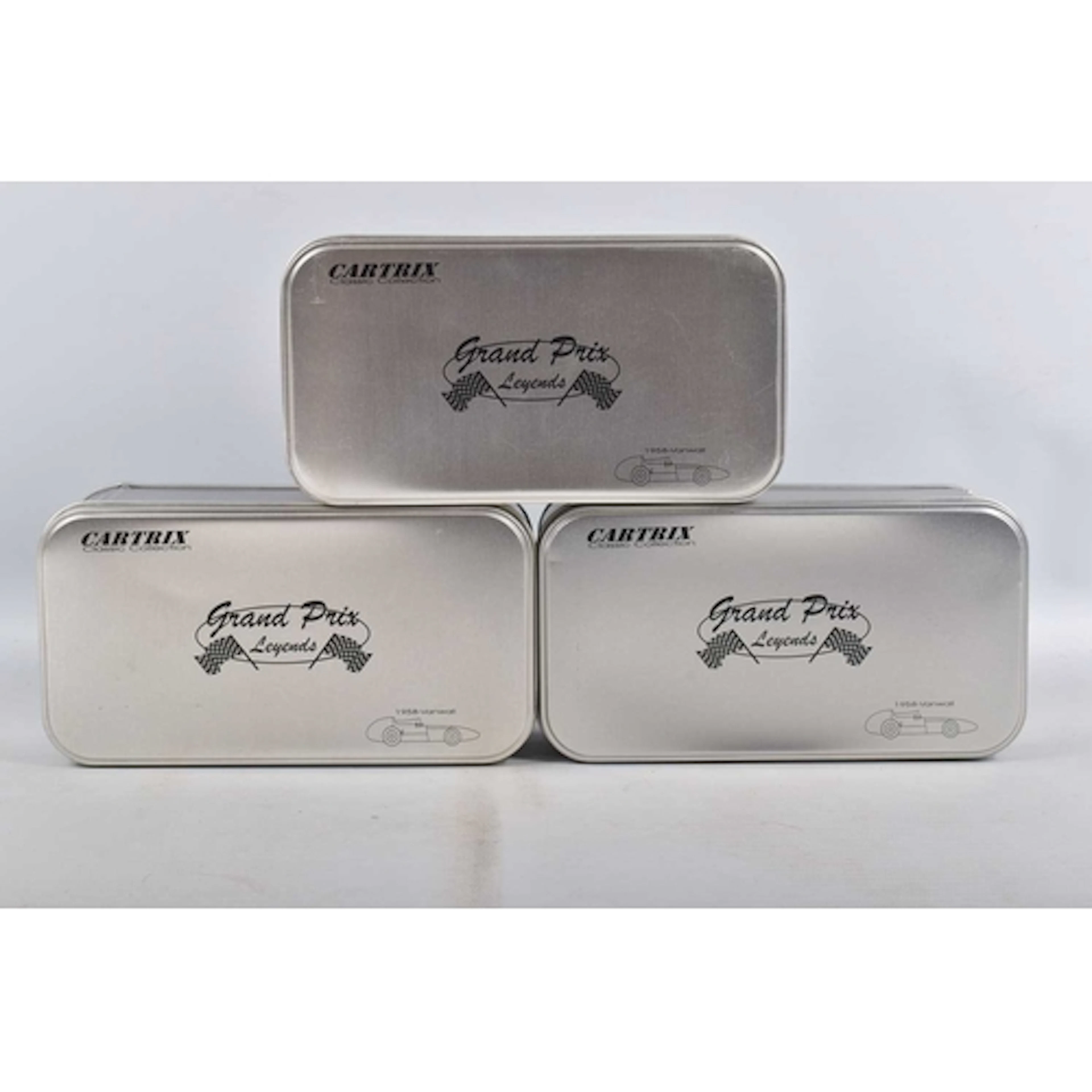 THREE CARTRIX GRAND PRIX LEGENDS SLOT CAR MODEL VEHICLES, to...