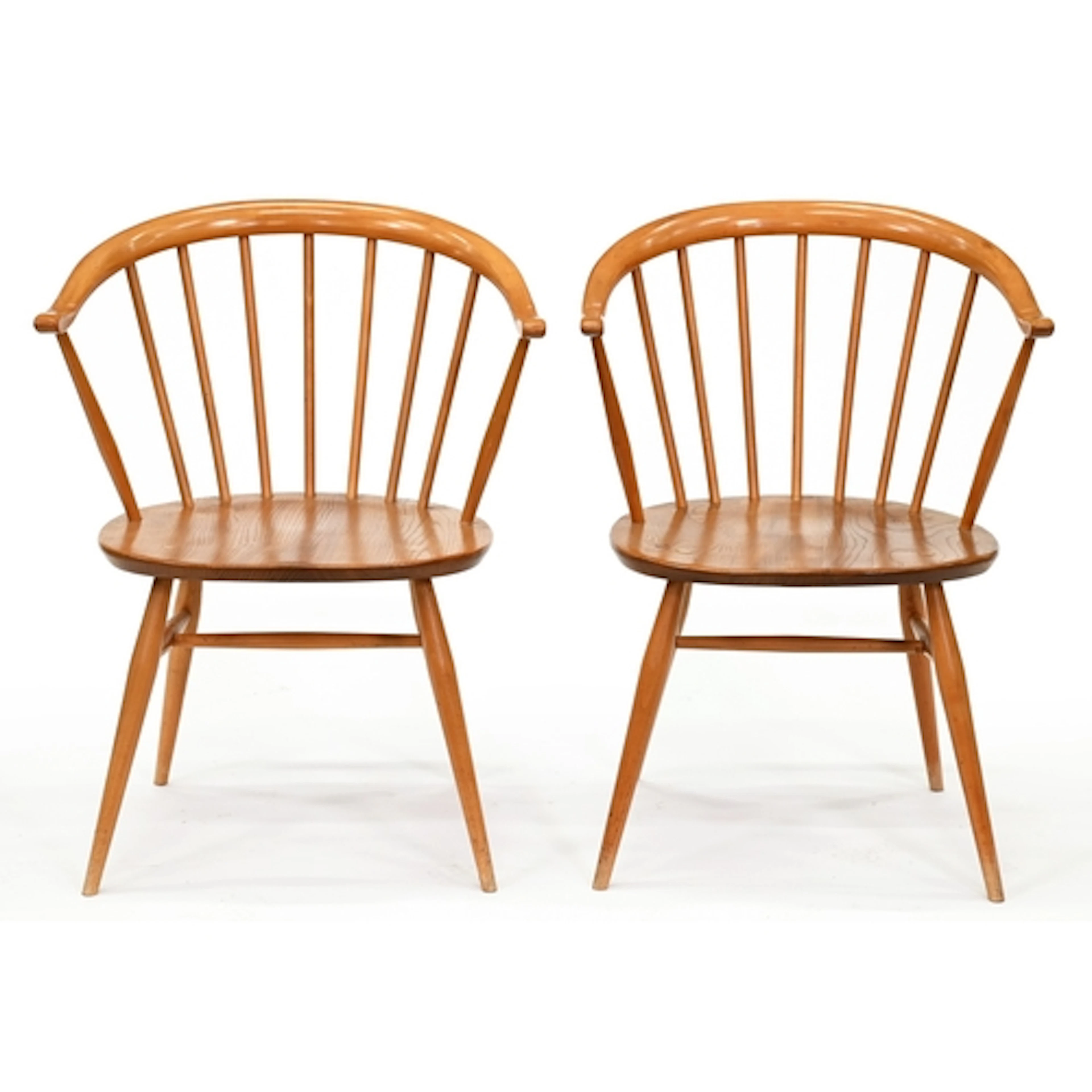 A pair of Ercol ash and elm Windsor chairs, c1970, 77cm h, m...