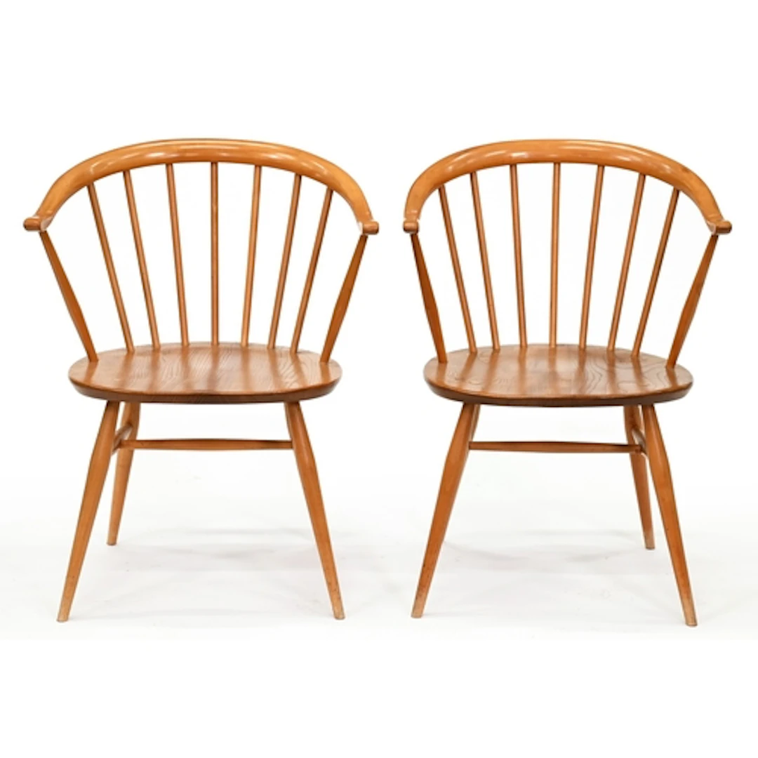 A pair of Ercol ash and elm Windsor chairs, c1970, 77cm h, m...