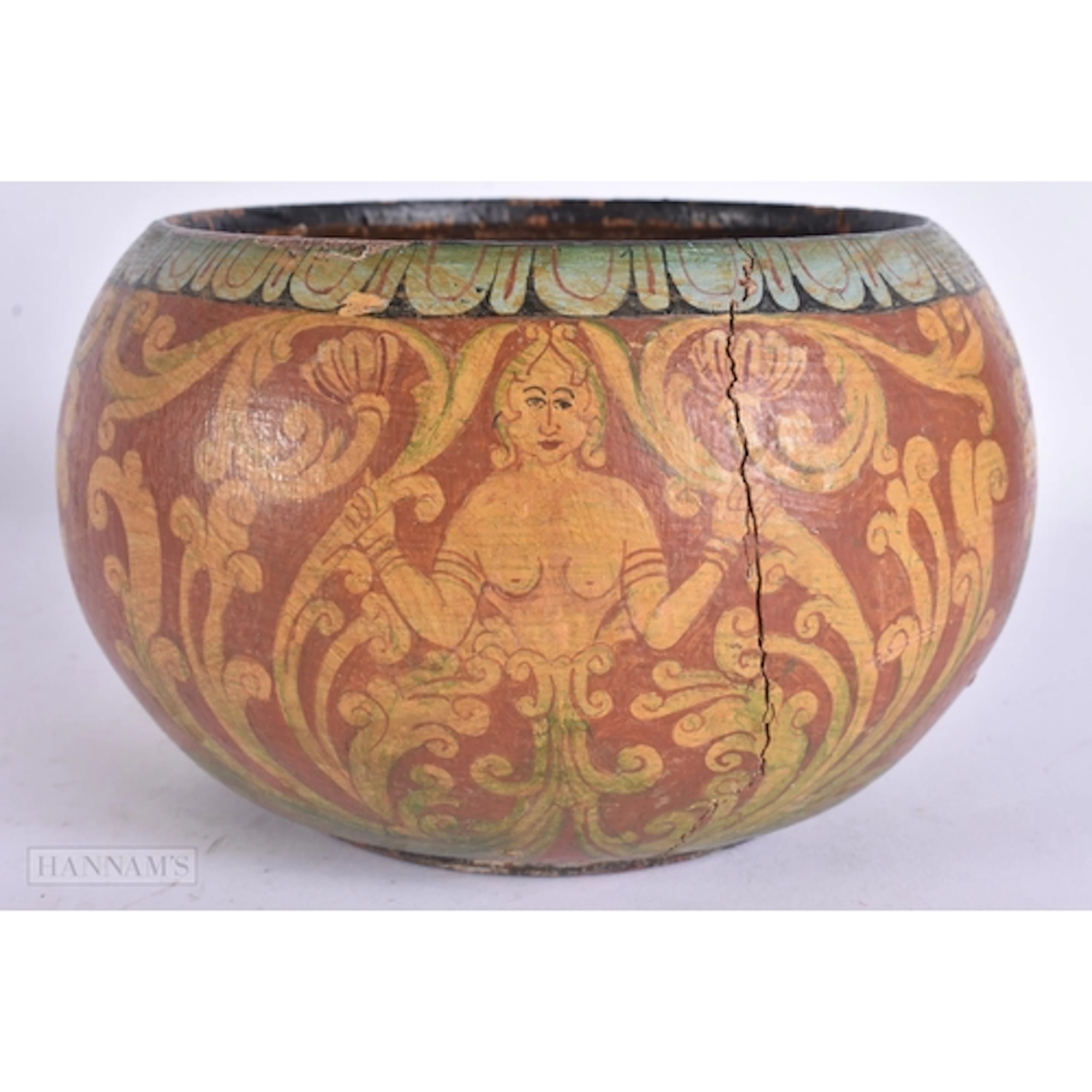 A LATE 19TH CENTURY INDIAN PAINTED WOOD BOWL depicting figur...