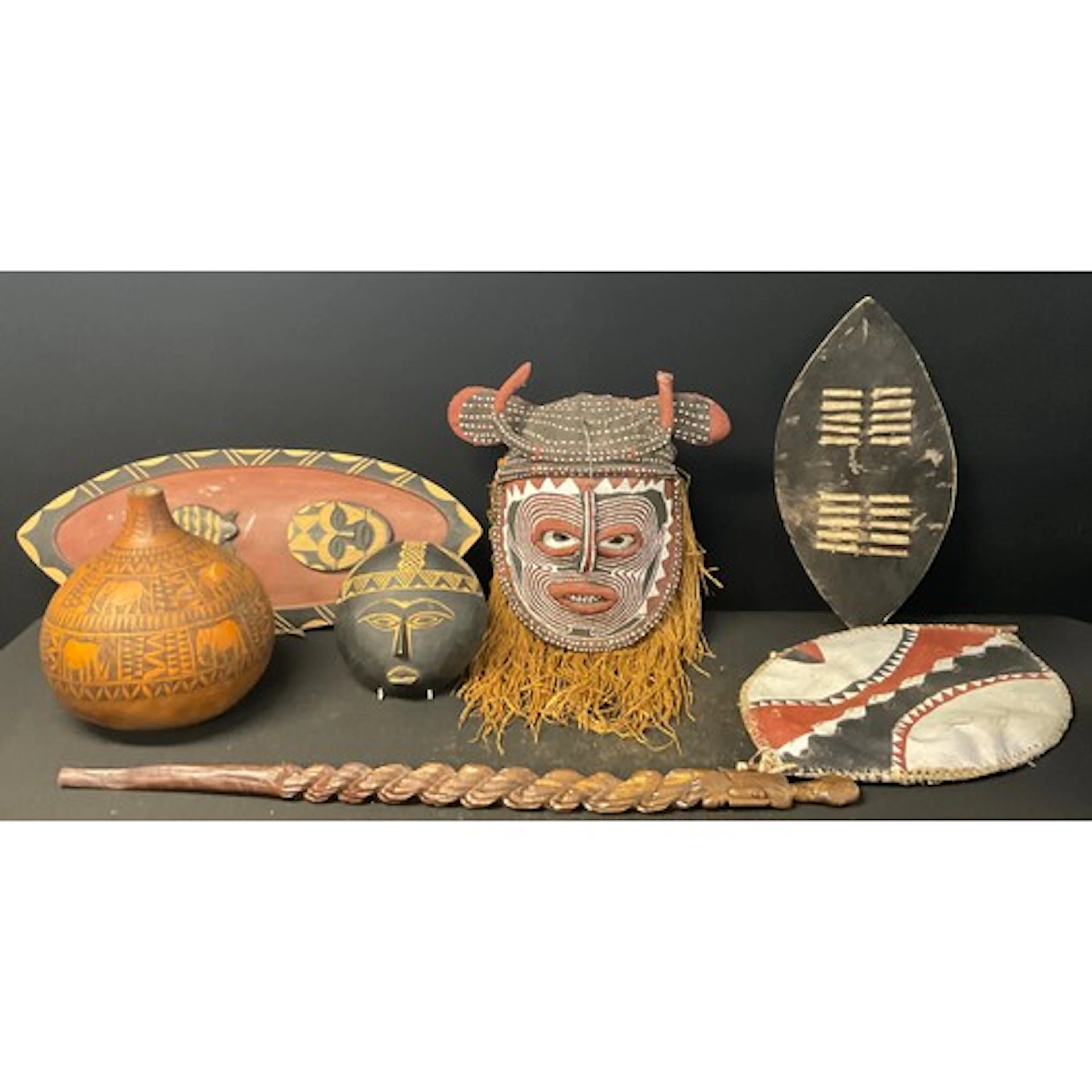 Tribal Art - an African calabash gourd vessel, carved with n...