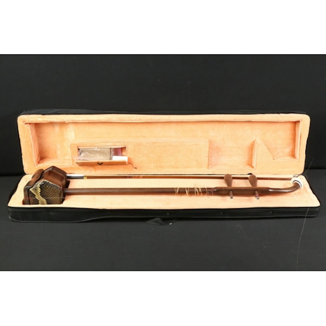 Chinese hardwood Erhu, having snake skin effect drum, housed...