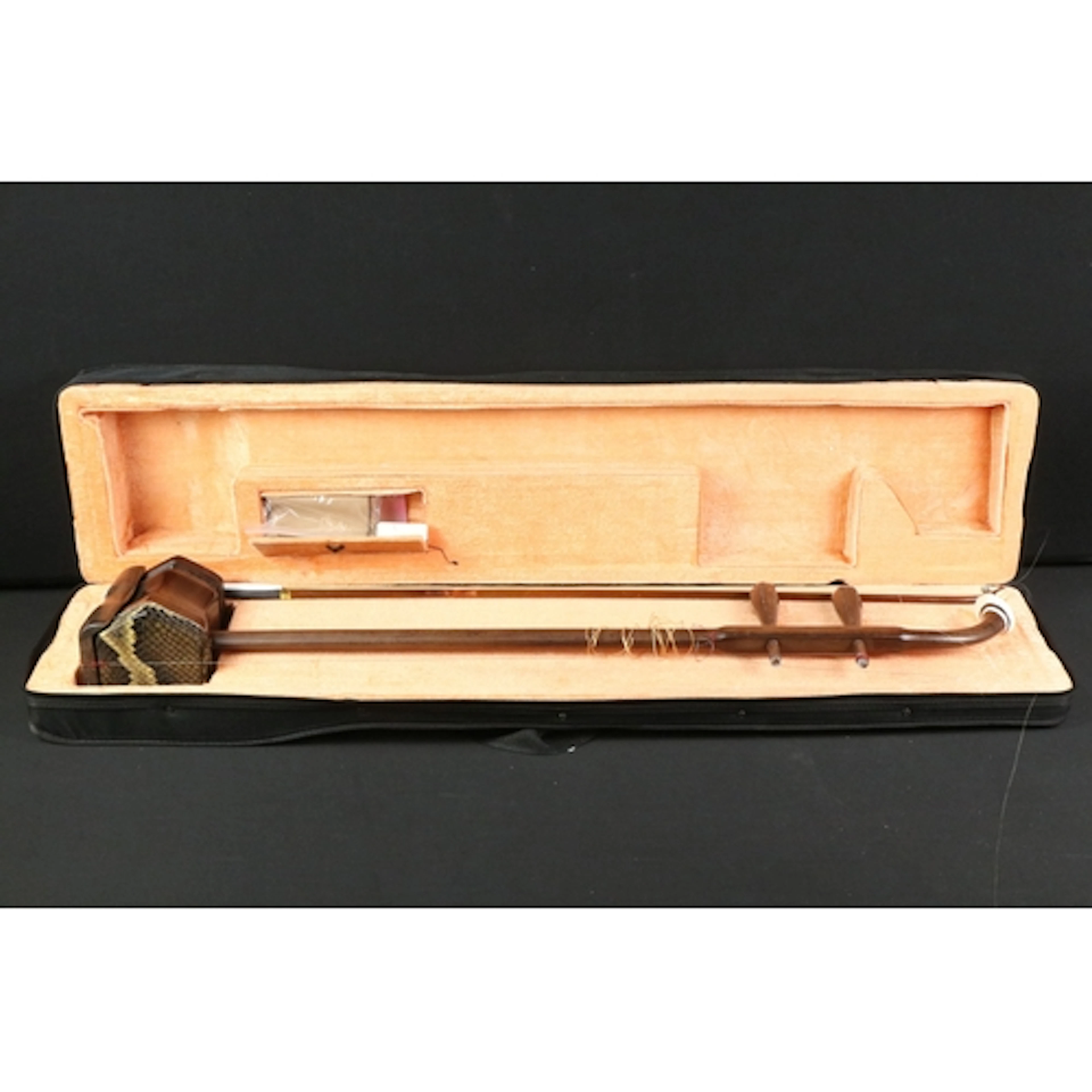 Chinese hardwood Erhu, having snake skin effect drum, housed...