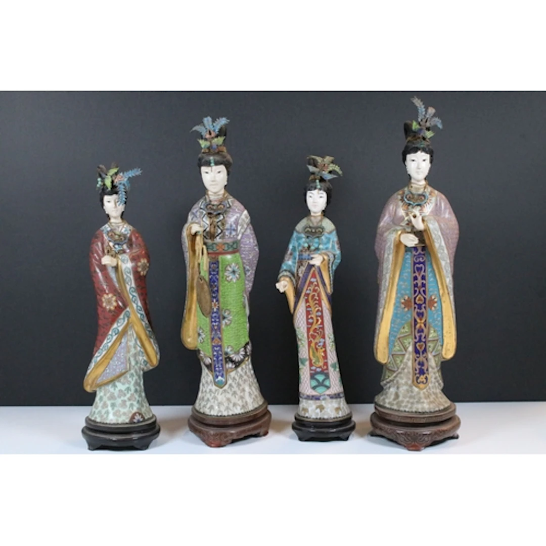 Four 20th century cloisonne geishas, each raised on a hardwo...