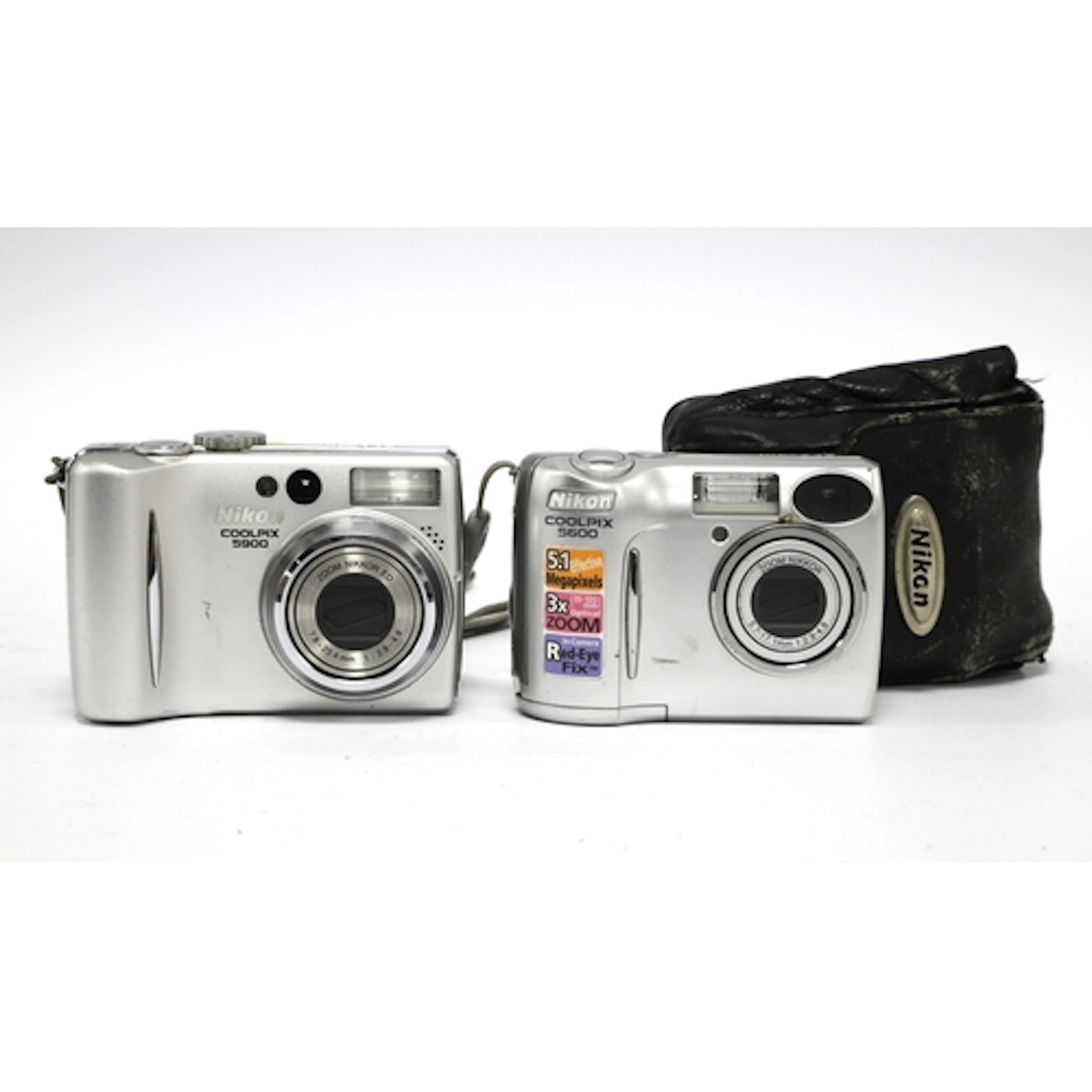 Nikon Coolpix 5900 Digital Compact Camera together with a Ni...