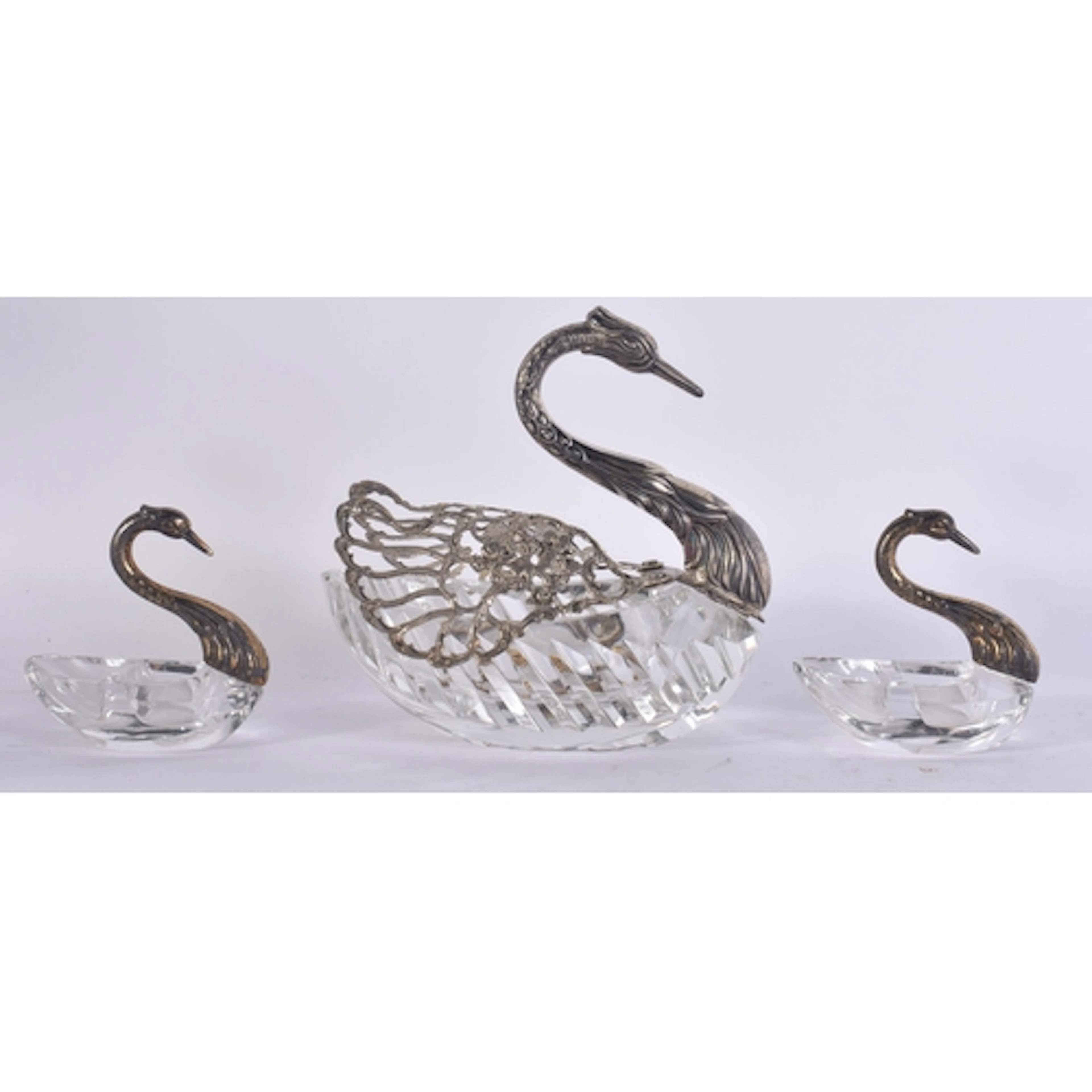 A LARGE ANTIQUE SILVER MOUNTED CUT GLASS SWAN together with ...