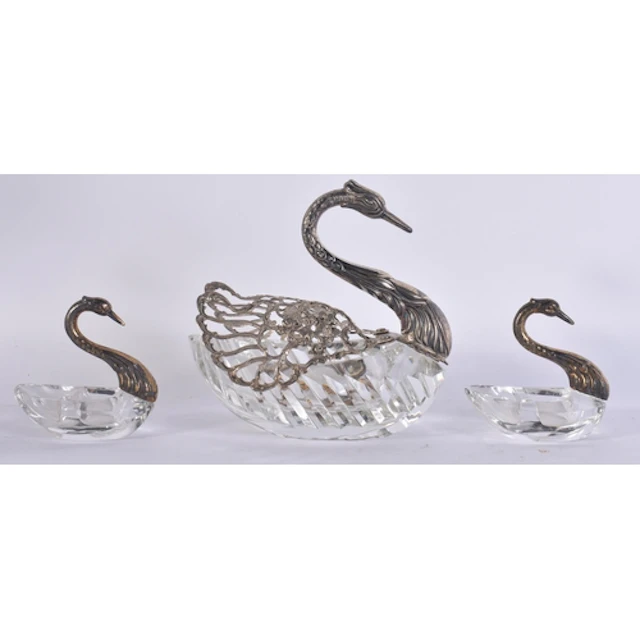 A LARGE ANTIQUE SILVER MOUNTED CUT GLASS SWAN together with ...