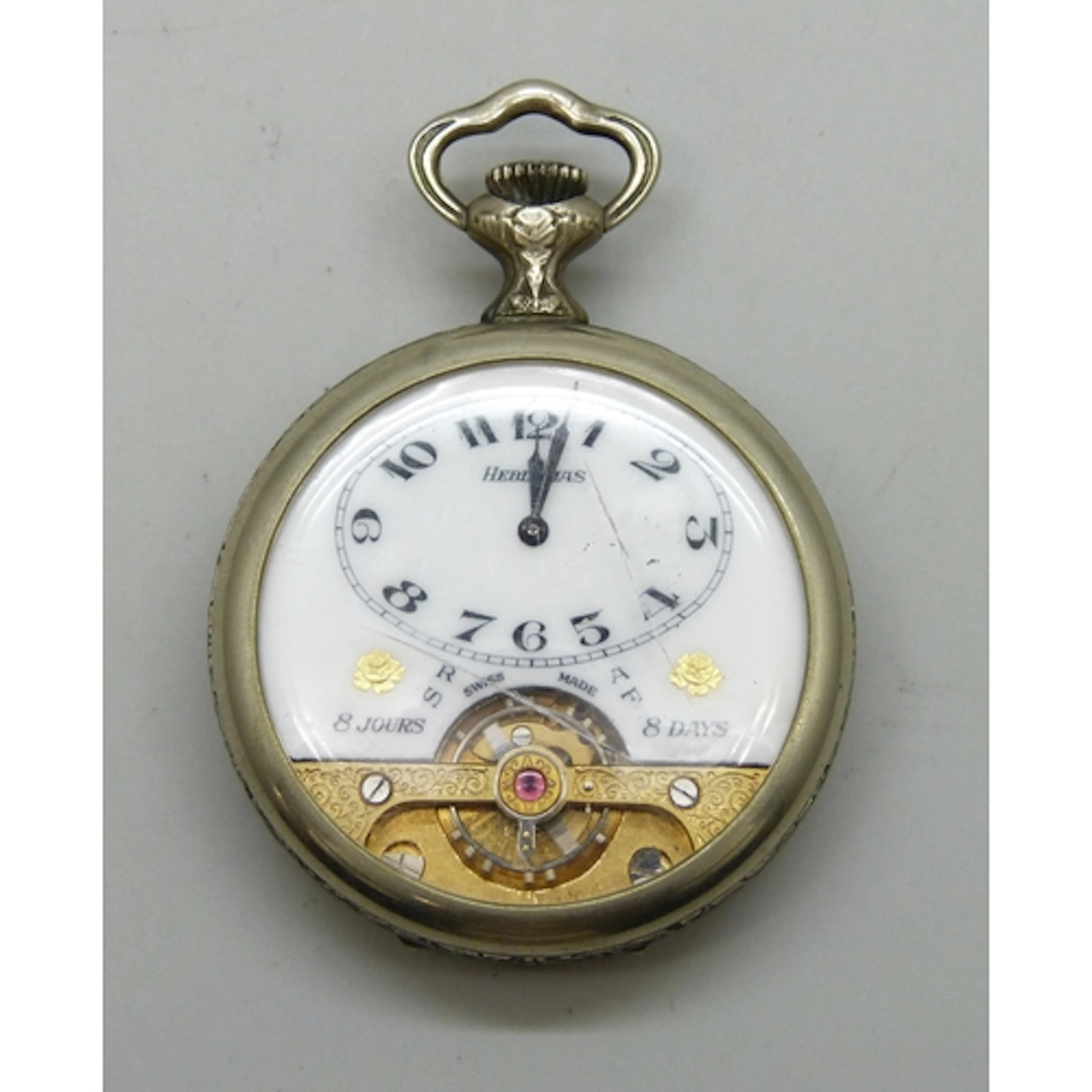 A Swiss Hebdomas 8 day pocket watch with embossed farming sc...