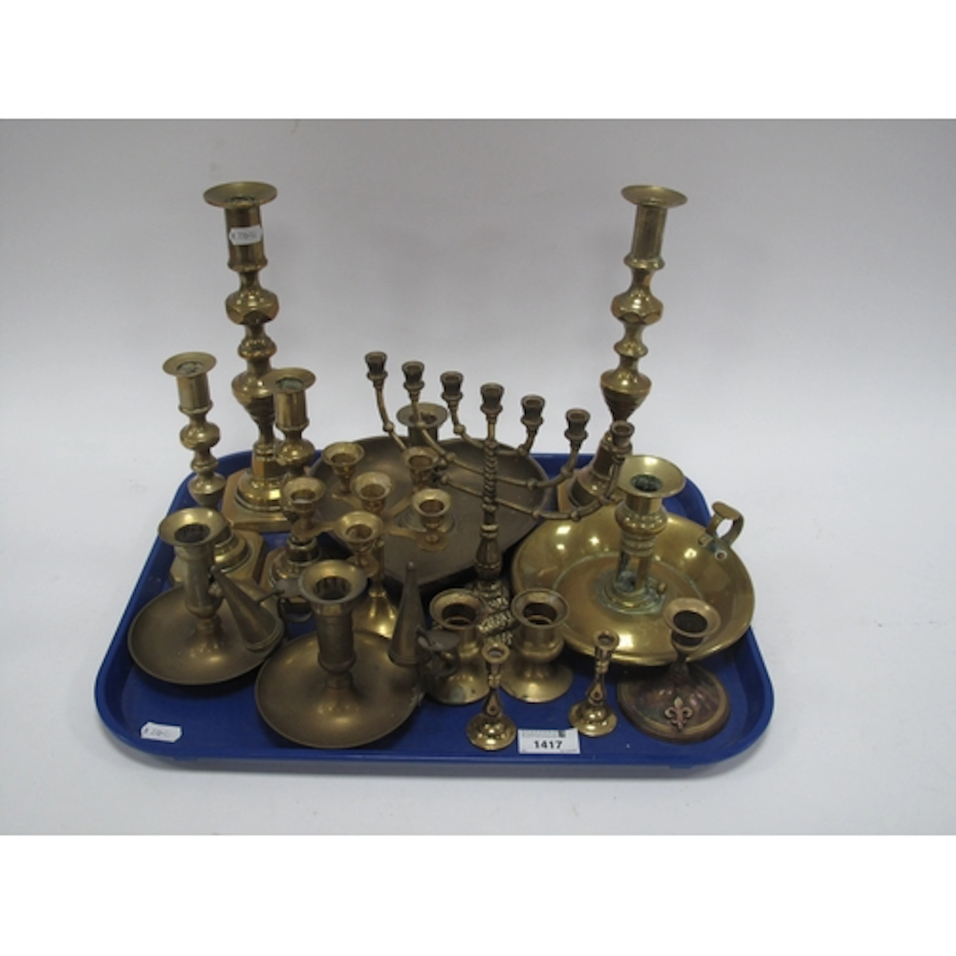 Collection of vintage brass candlesticks and lighting access...