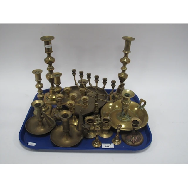 Collection of vintage brass candlesticks and lighting access...