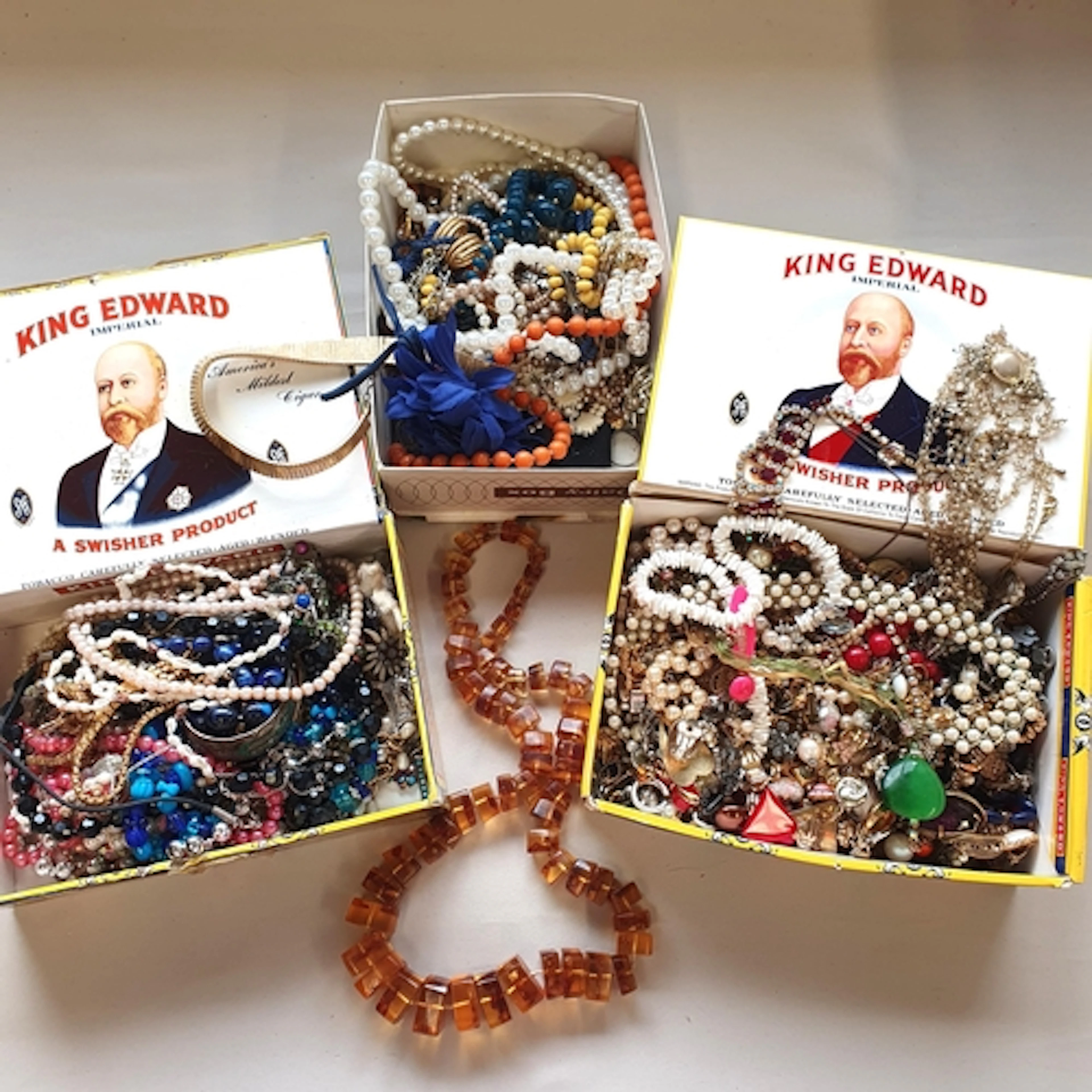 An ambroid graduated Necklace and a quantity of Costume Jewe...