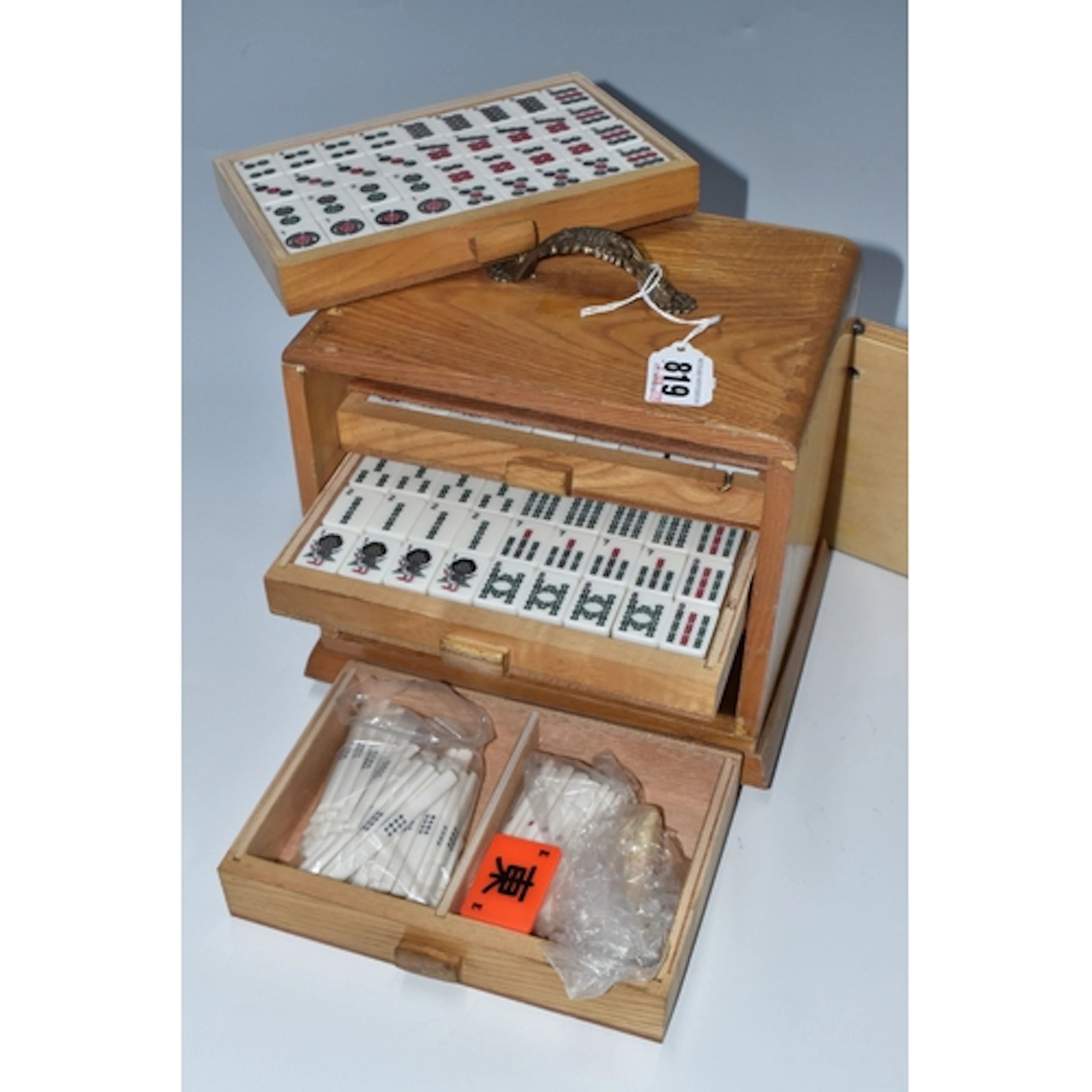A CASED MAHJONG SET with the standard one hundred and forty ...