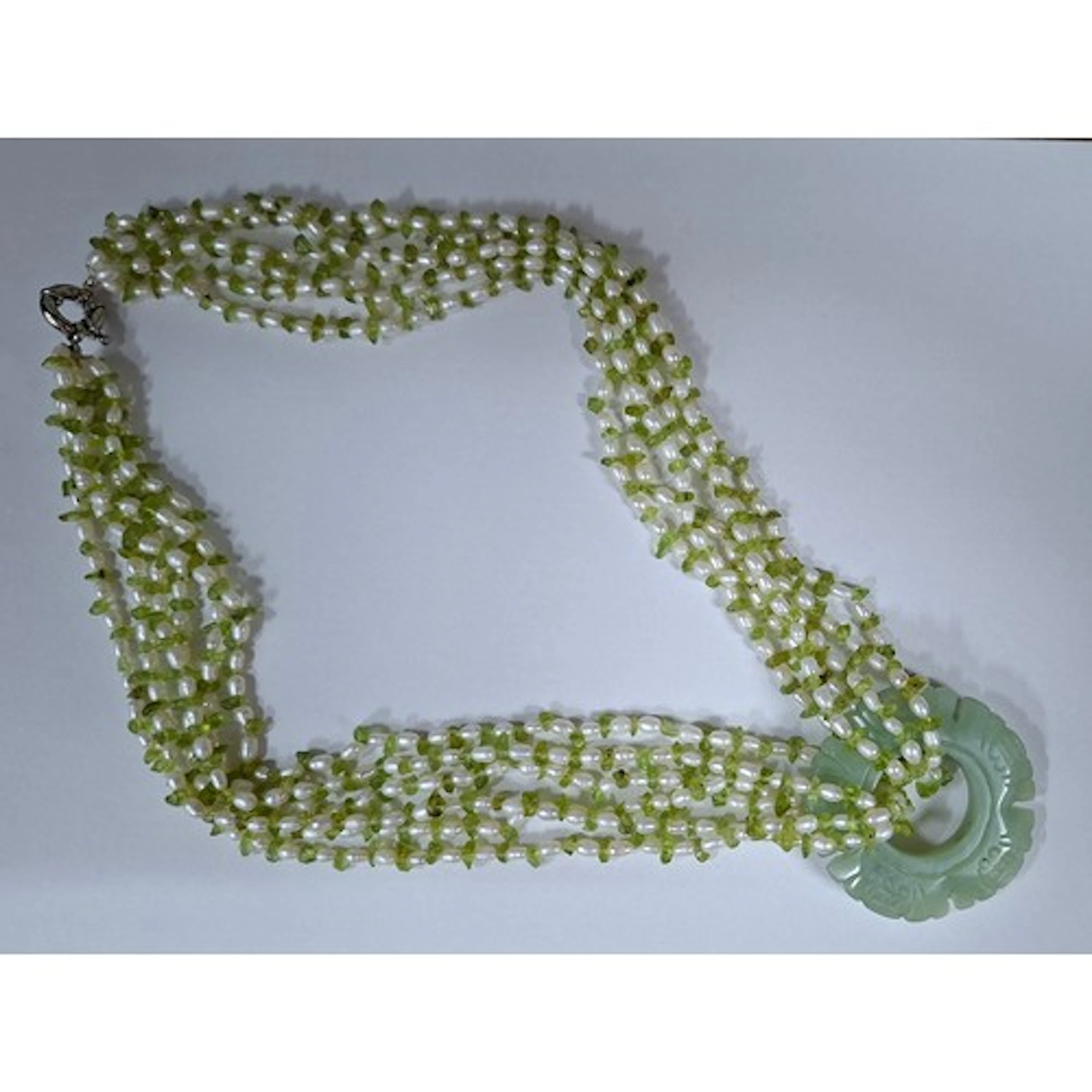 A jade, freshwater rice pearl and green stone chip multi-str...