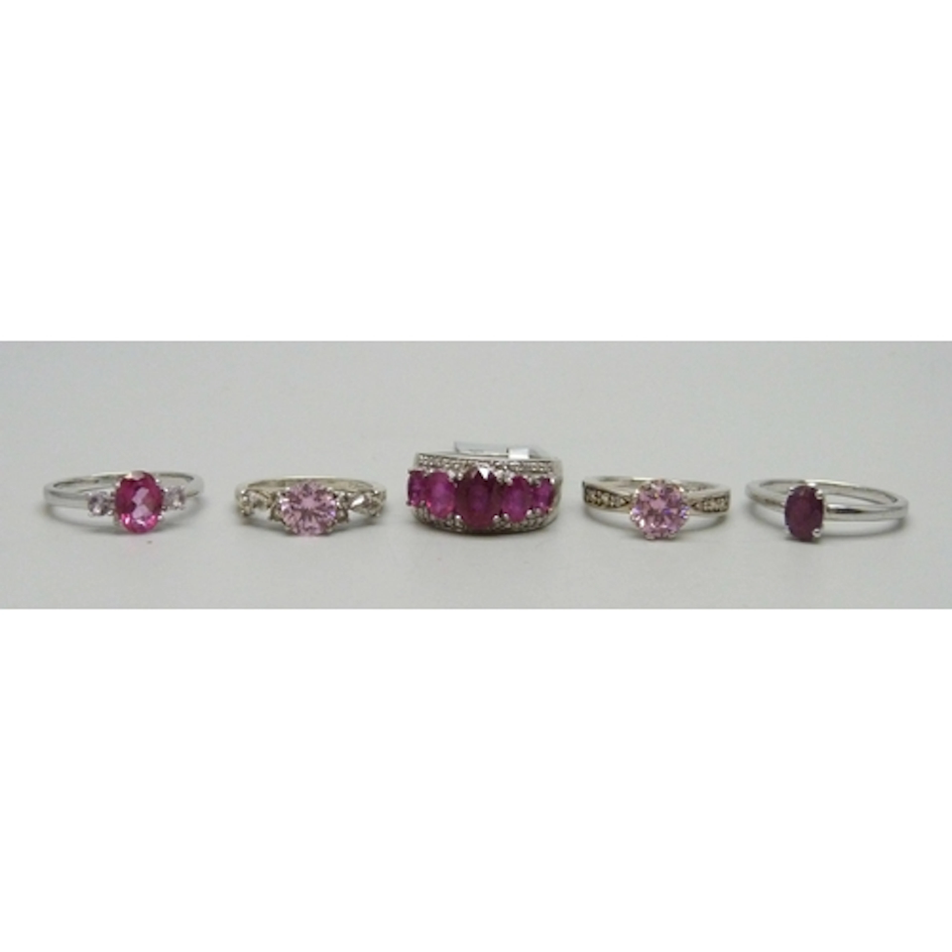 Five silver gemstone rings including TGGC, 17g total