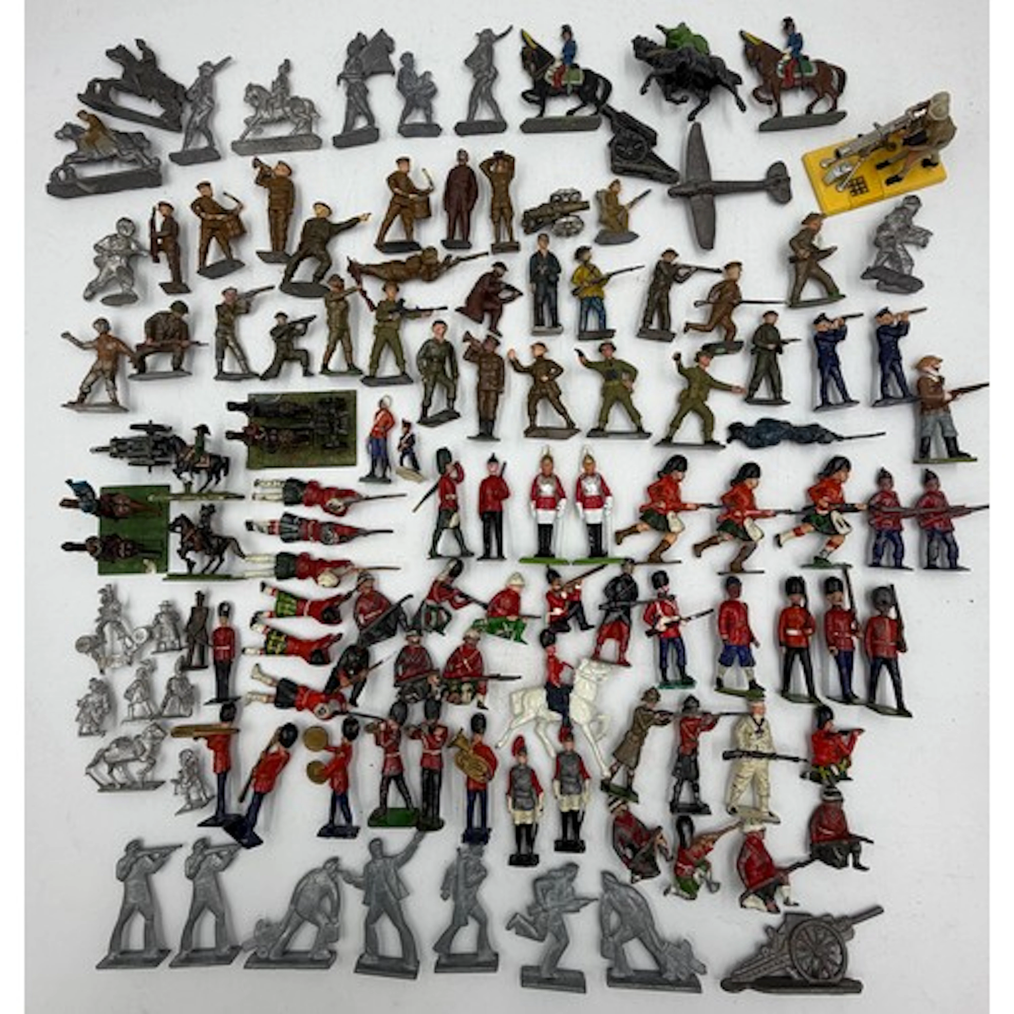 A large collection of lead figures by Britains and John Hill...