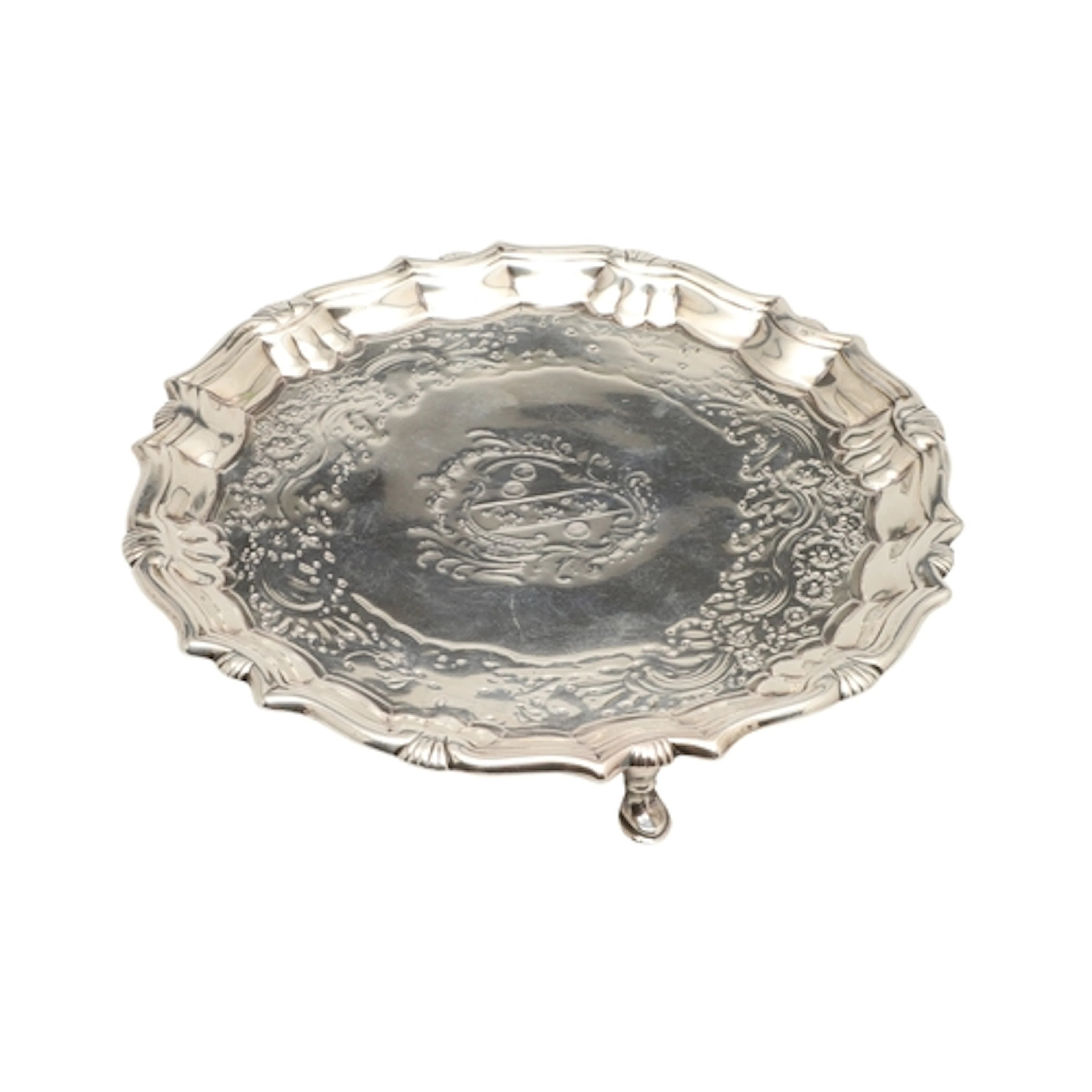 A GEORGE II SILVER WAITER. With cast border, the centre feat...