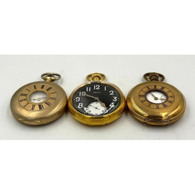 Three brass pocket watches two half hunters and a Rolex....