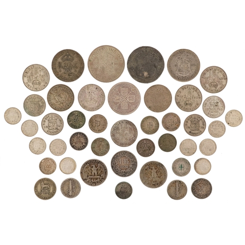 A quantity of pre 1947 silver coins comprising three pence p...