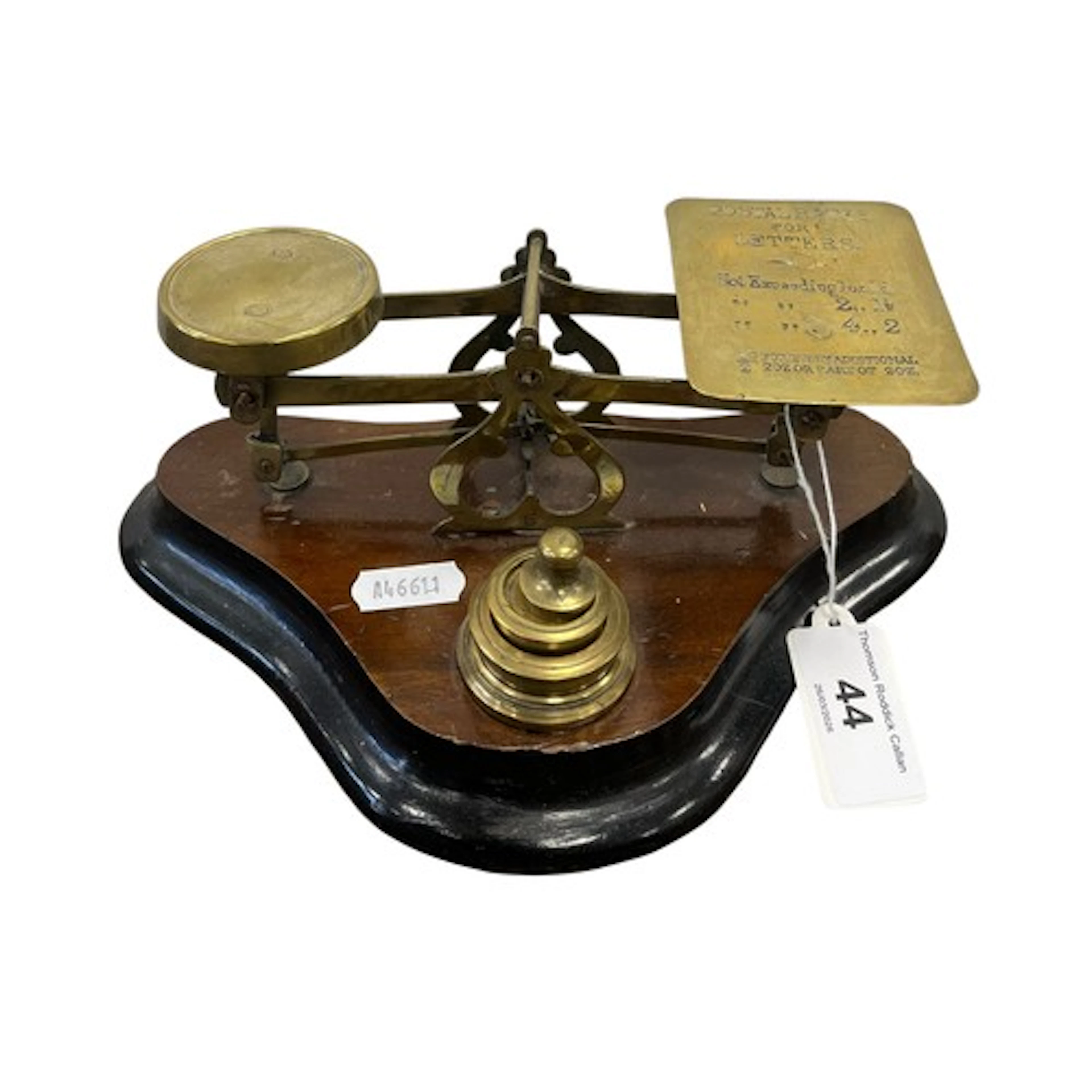 Vintage brass postal scales.