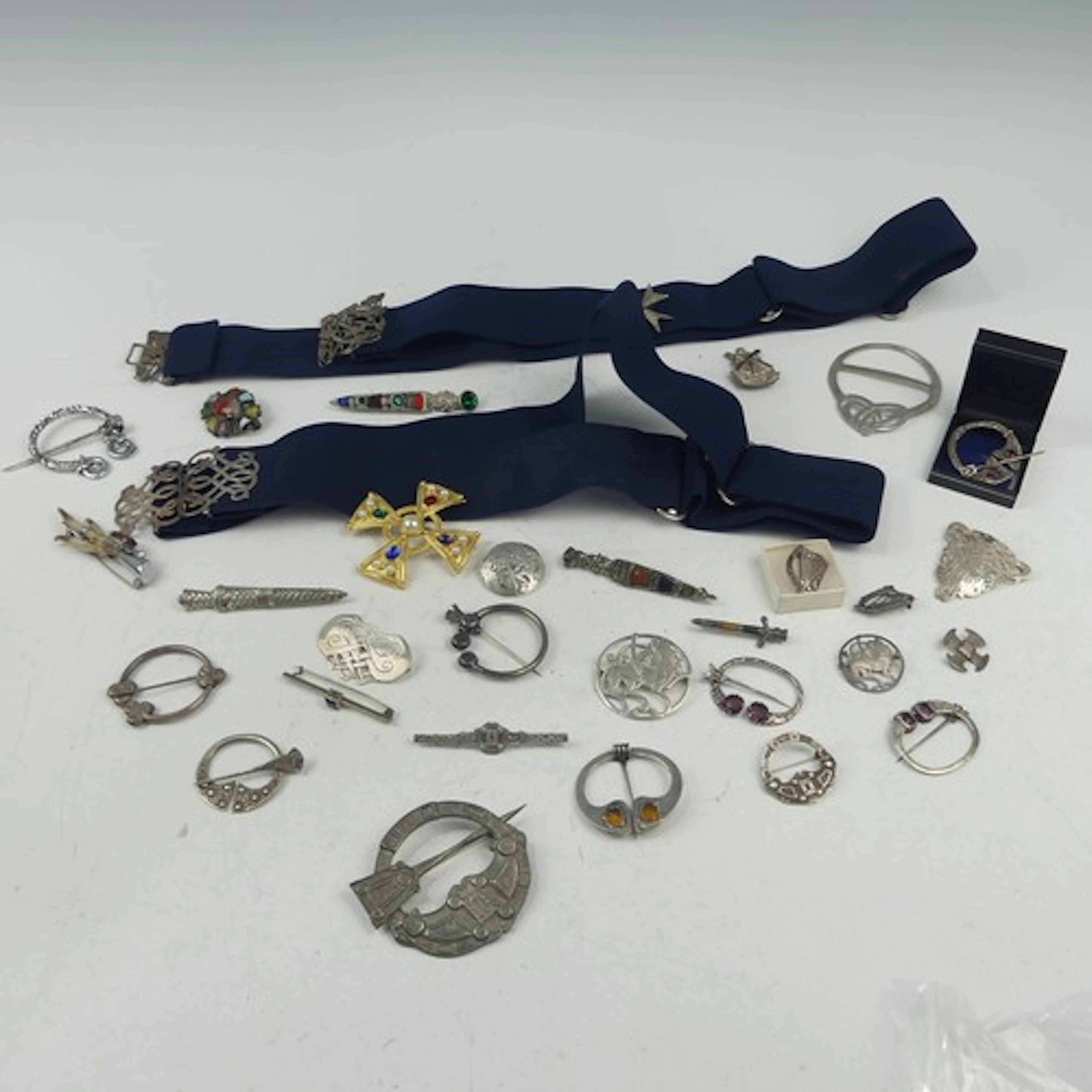 A collection of Scottish silver Celtic and Viking Revival Br...
