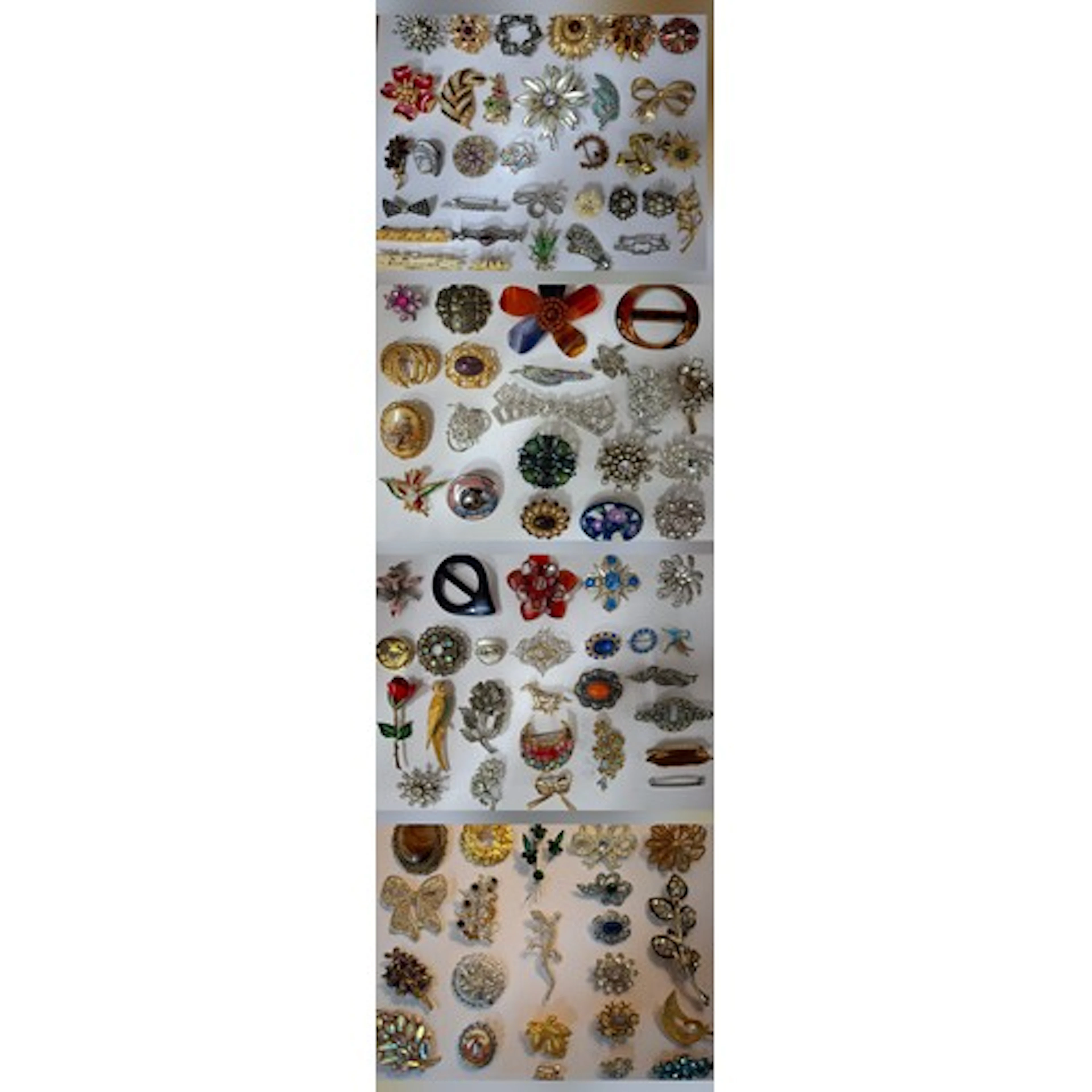 A collection of vintage brooches to include Avon, Sphinx, a ...