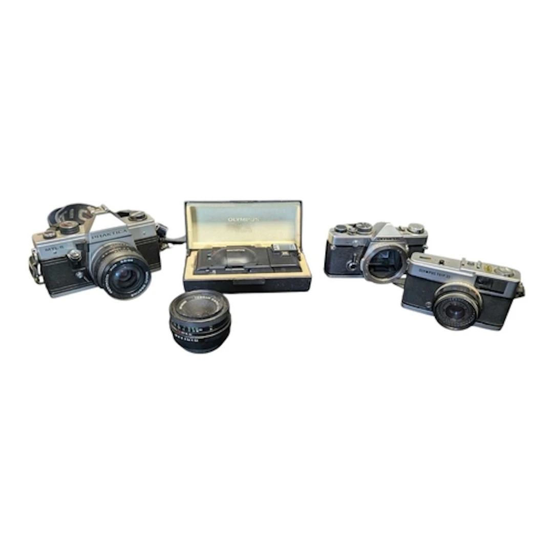 A collection of vintage 20th century 35mm cameras. The colle...
