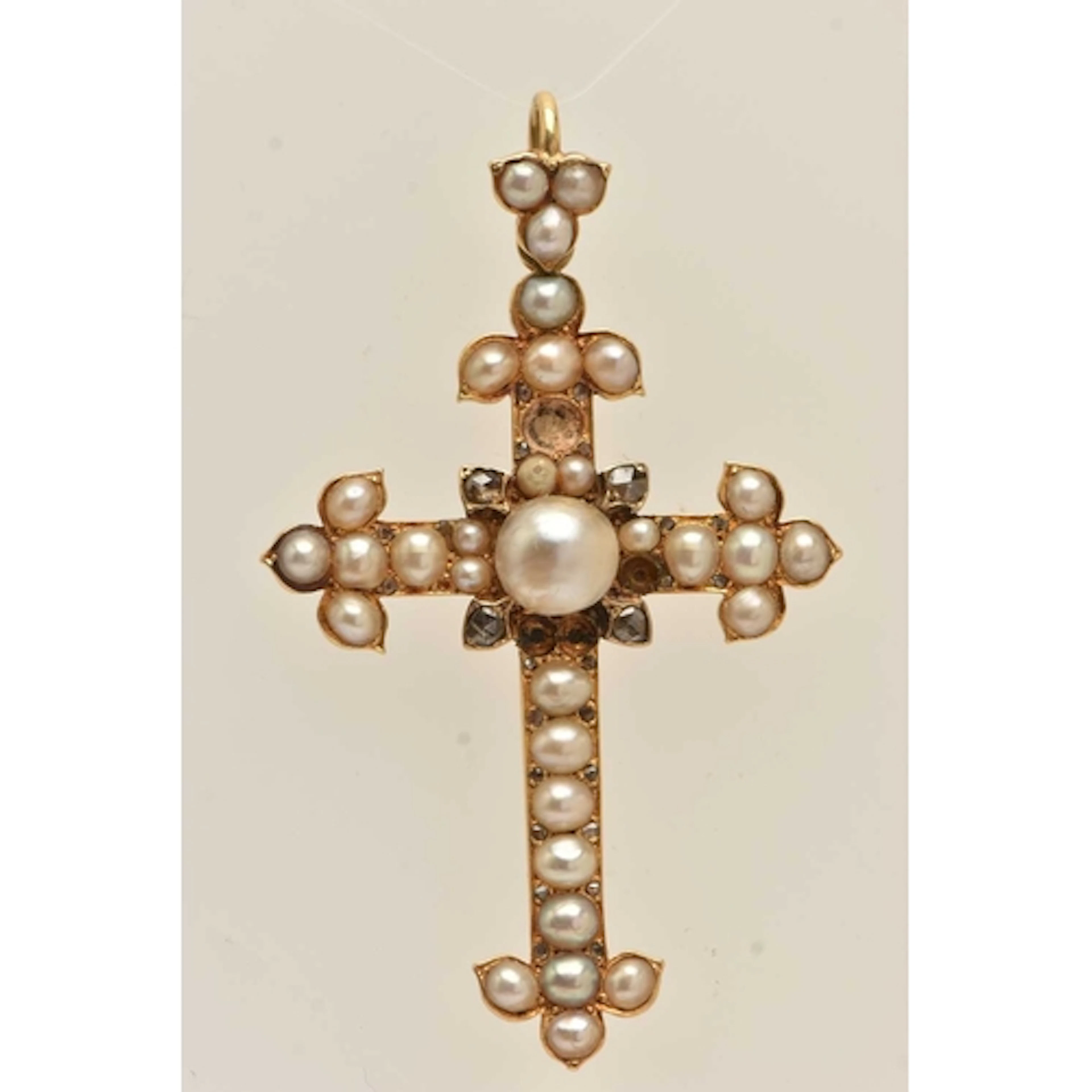 A 19TH CENTURY CROSS PENDANT, a large yellow metal cross set...