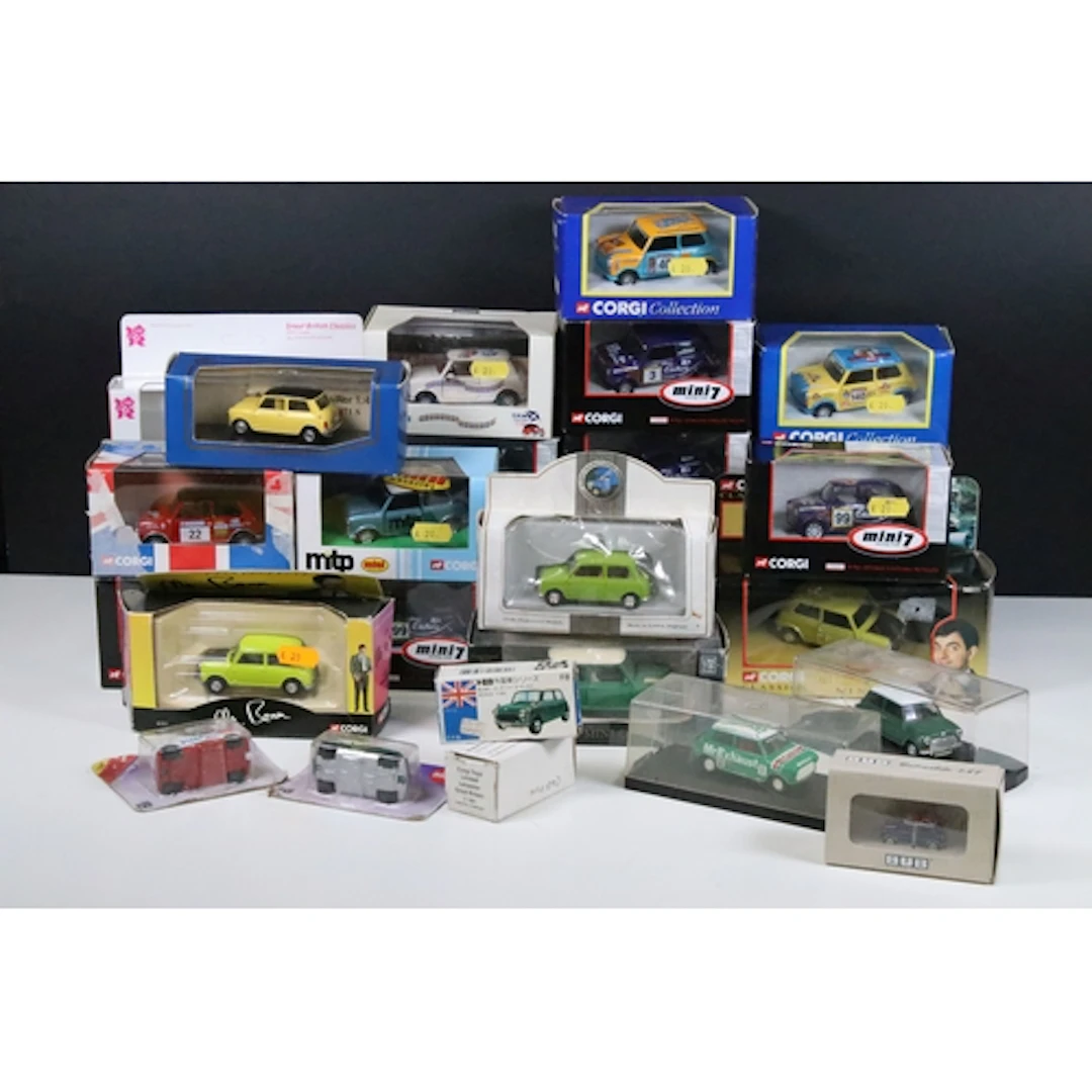 28 Boxed / cased / carded Mini related diecast models to inc...