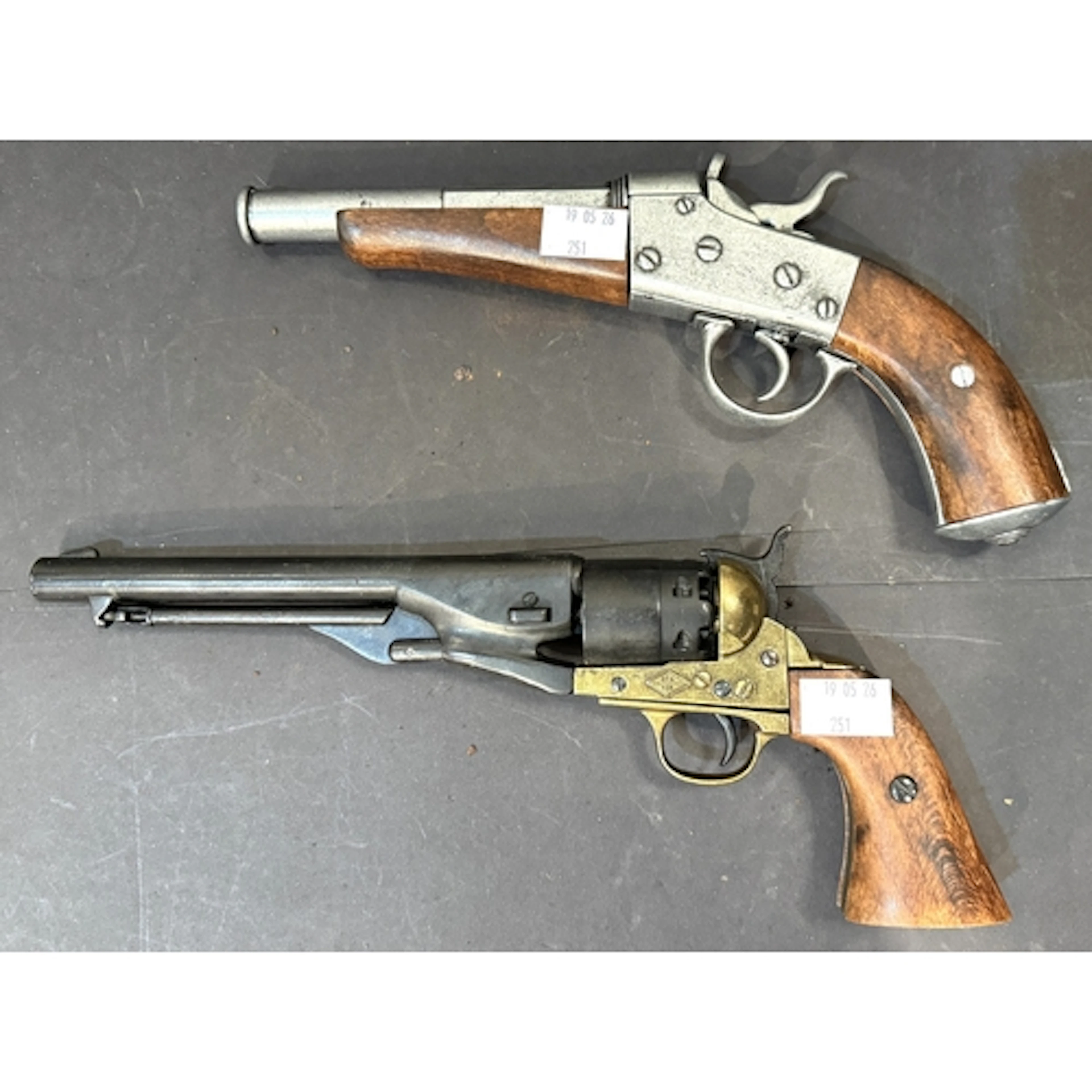 Vintage display model hand guns including a rolling block pi...