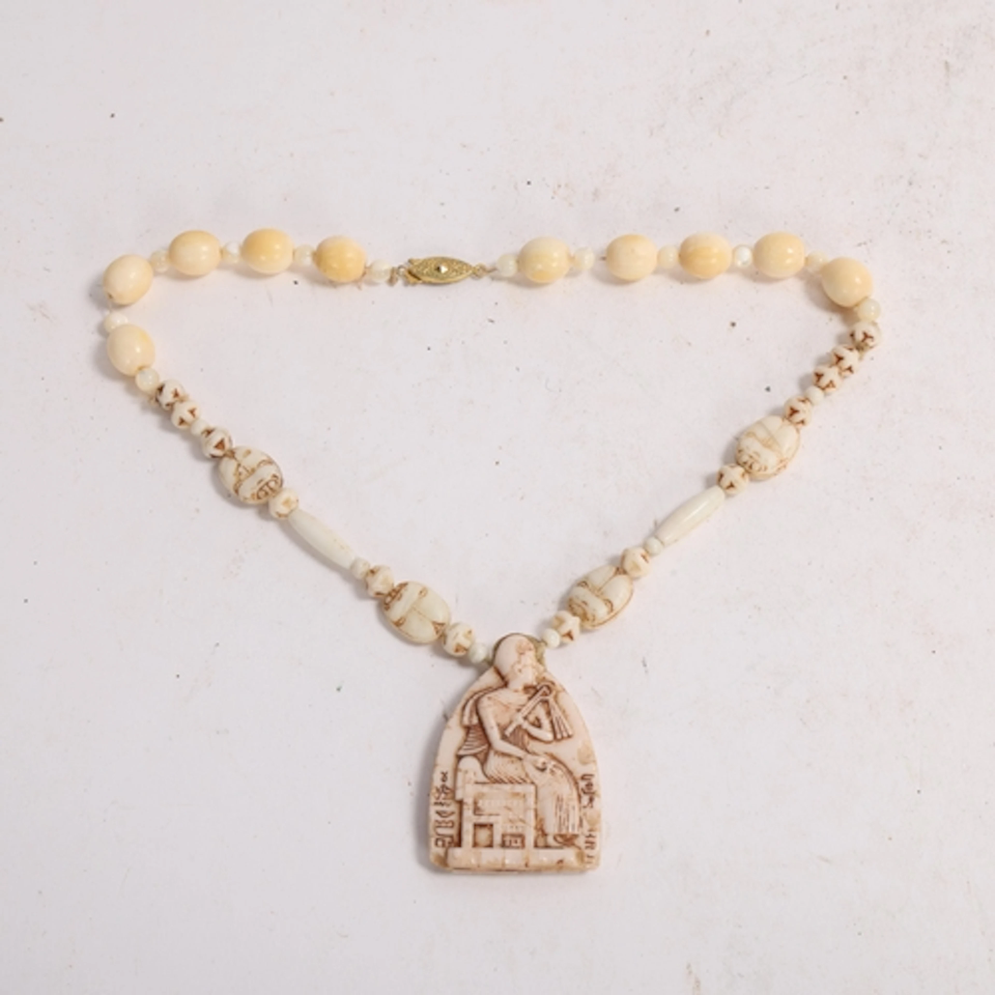 Max Neiger (Czechoslovakia), Egyptian Revival glass necklace...