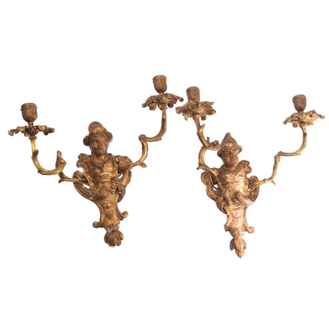 A pair of Continental carved and giltwood and gilt metal mou...