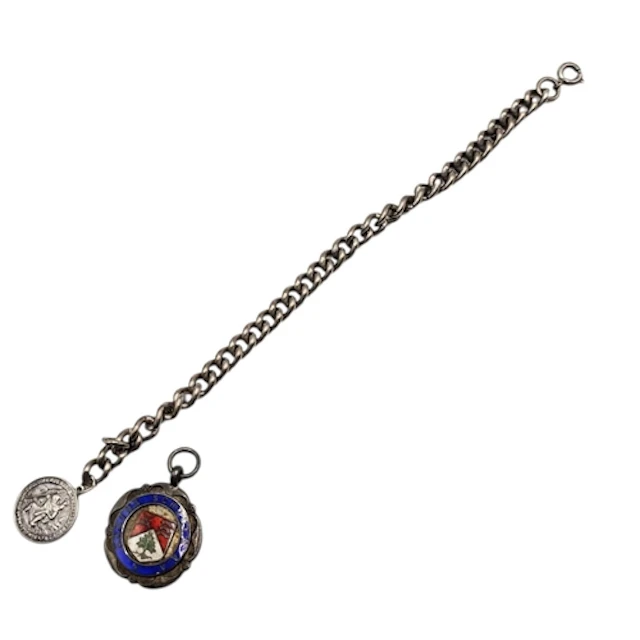 AN EARLY 20TH SILVER ALBERT WATCH CHAIN AND SILVER ENAMEL FO...