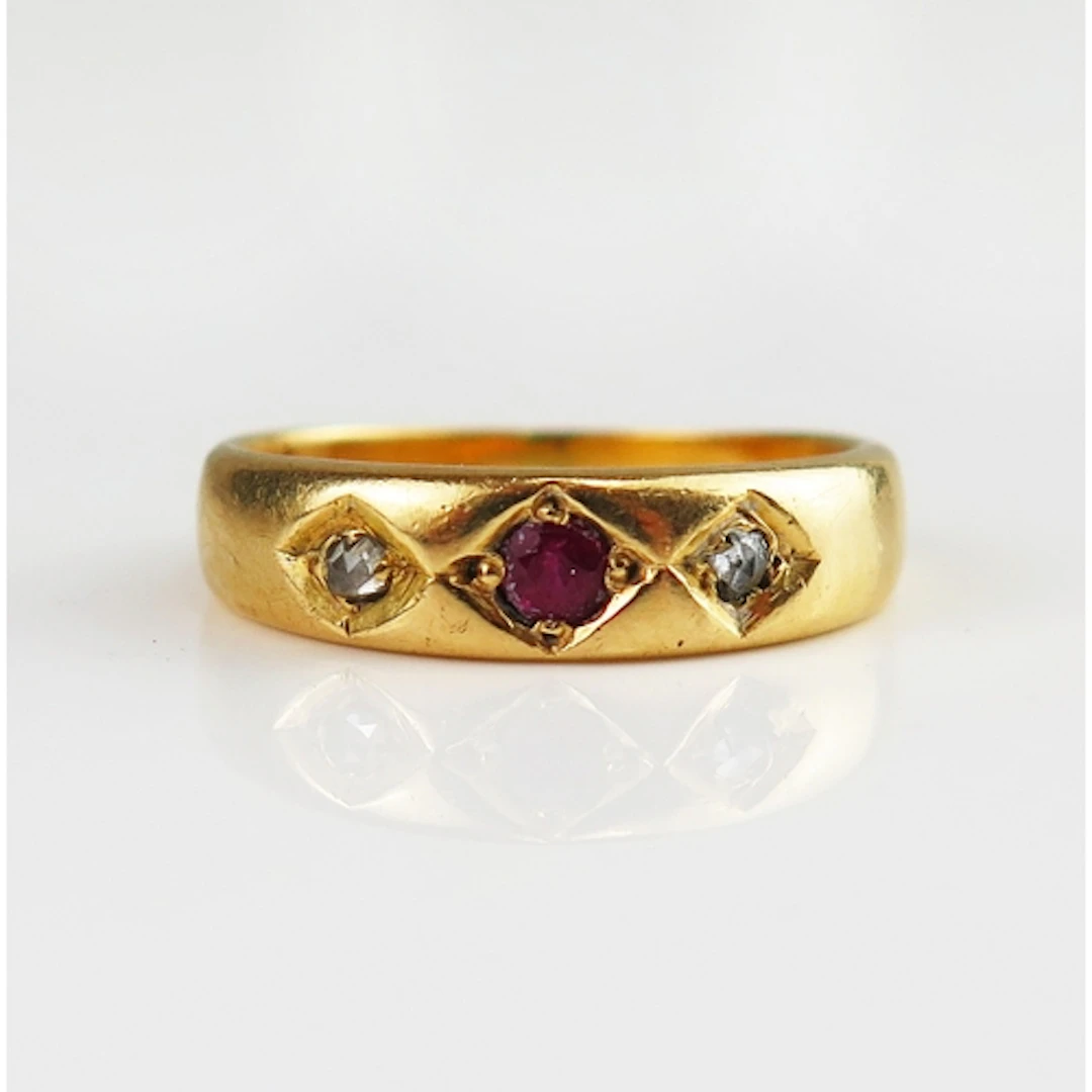 A Victorian ruby and rose cut diamond gypsy ring in a high c...