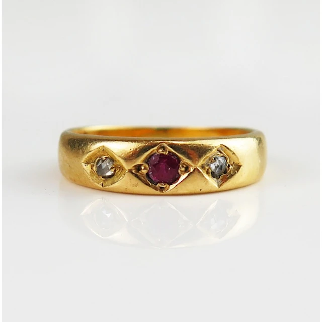 A Victorian ruby and rose cut diamond gypsy ring in a high c...