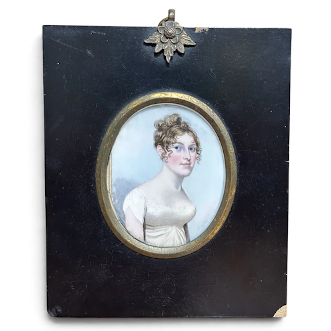 AN EARLY 19TH CENTURY PORTRAIT MINIATURE, DEPICTING A PORTRA...