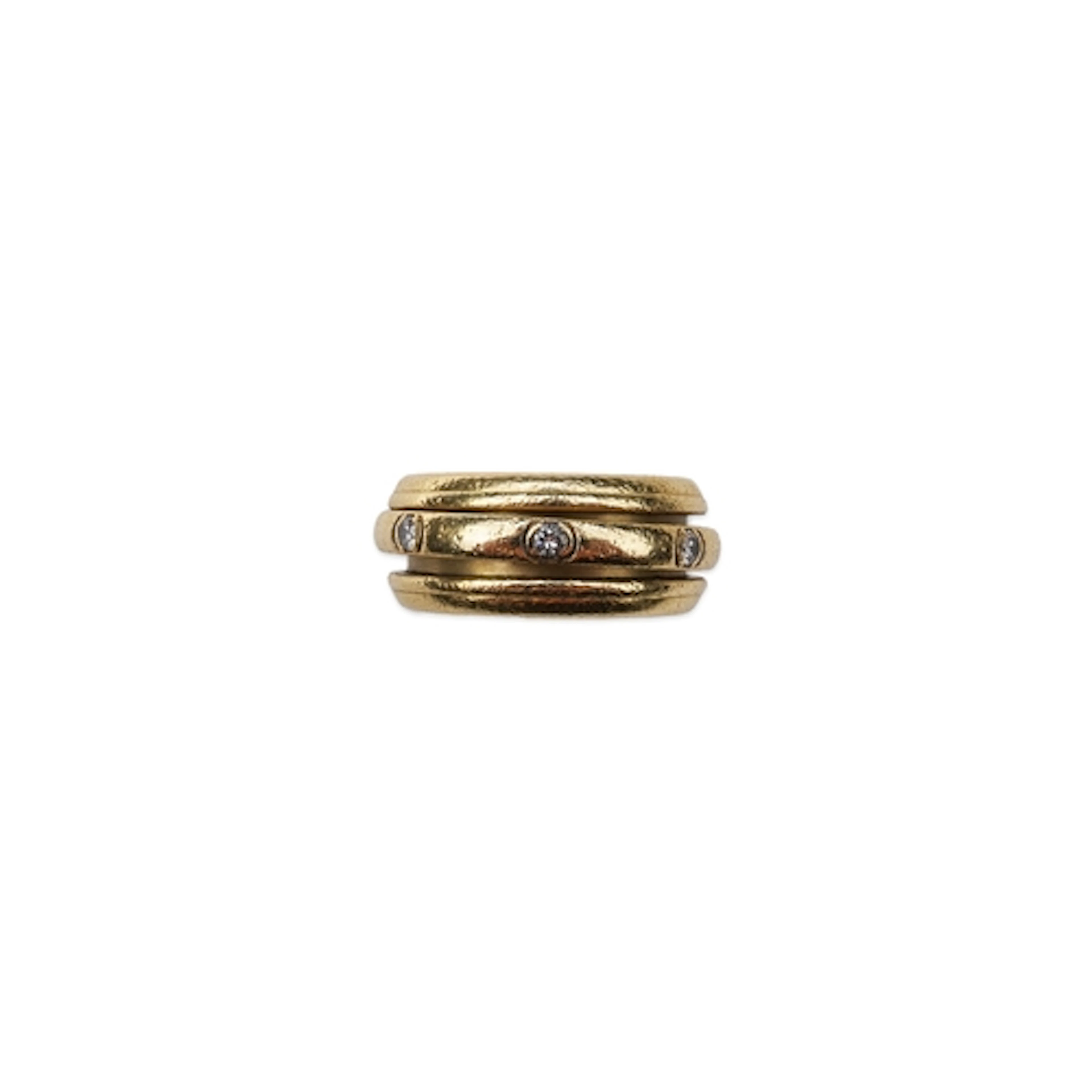 Piaget, a gold and diamond 'Possession' ring, the wide band ...