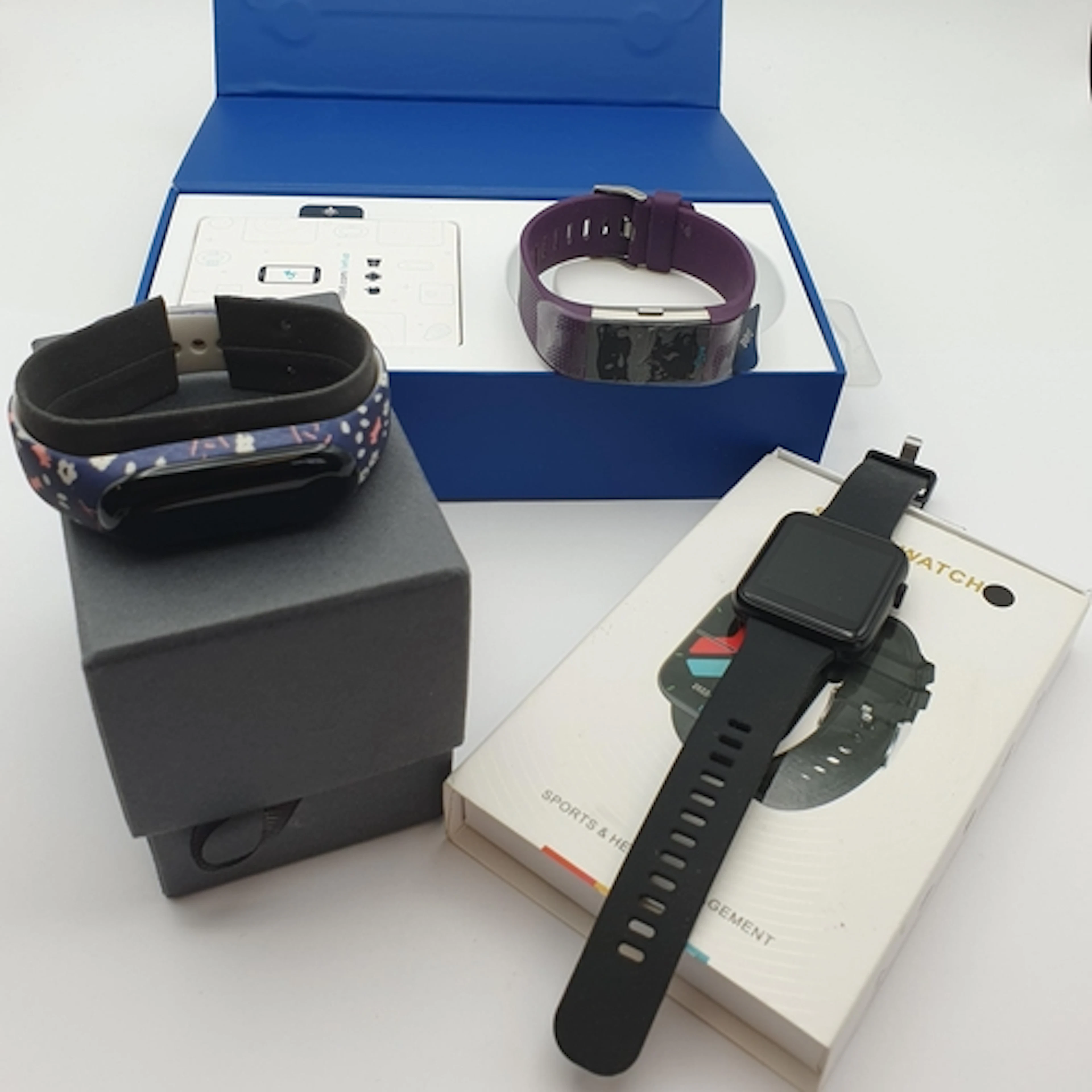 A Fitbit Charge 2 heart rate and fitness Wristband, an 'iTim...