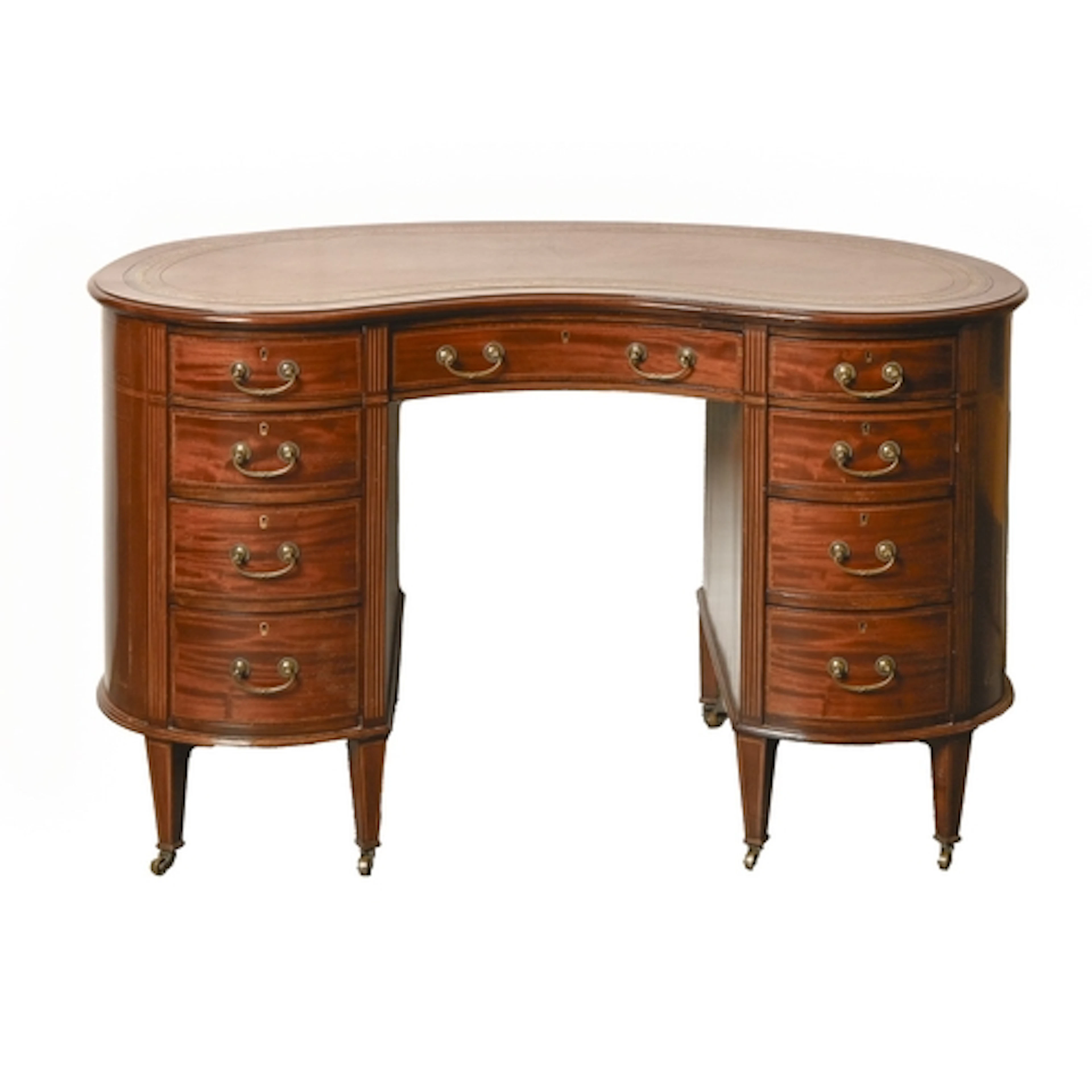An Edwardian inlaid mahogany kidney shaped desk, inset with ...
