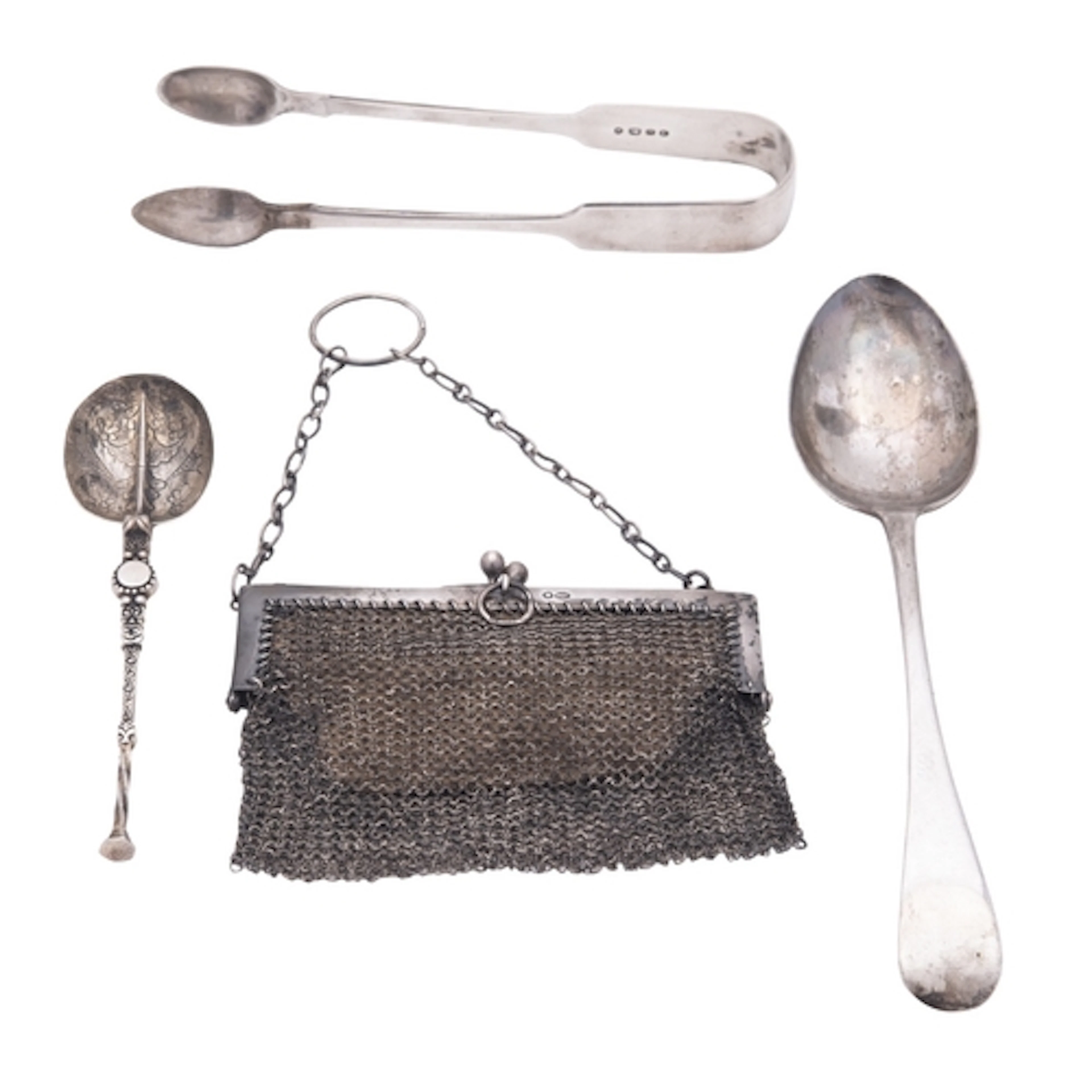 A small mixed lot of silver, to include a dessert spoon, a C...