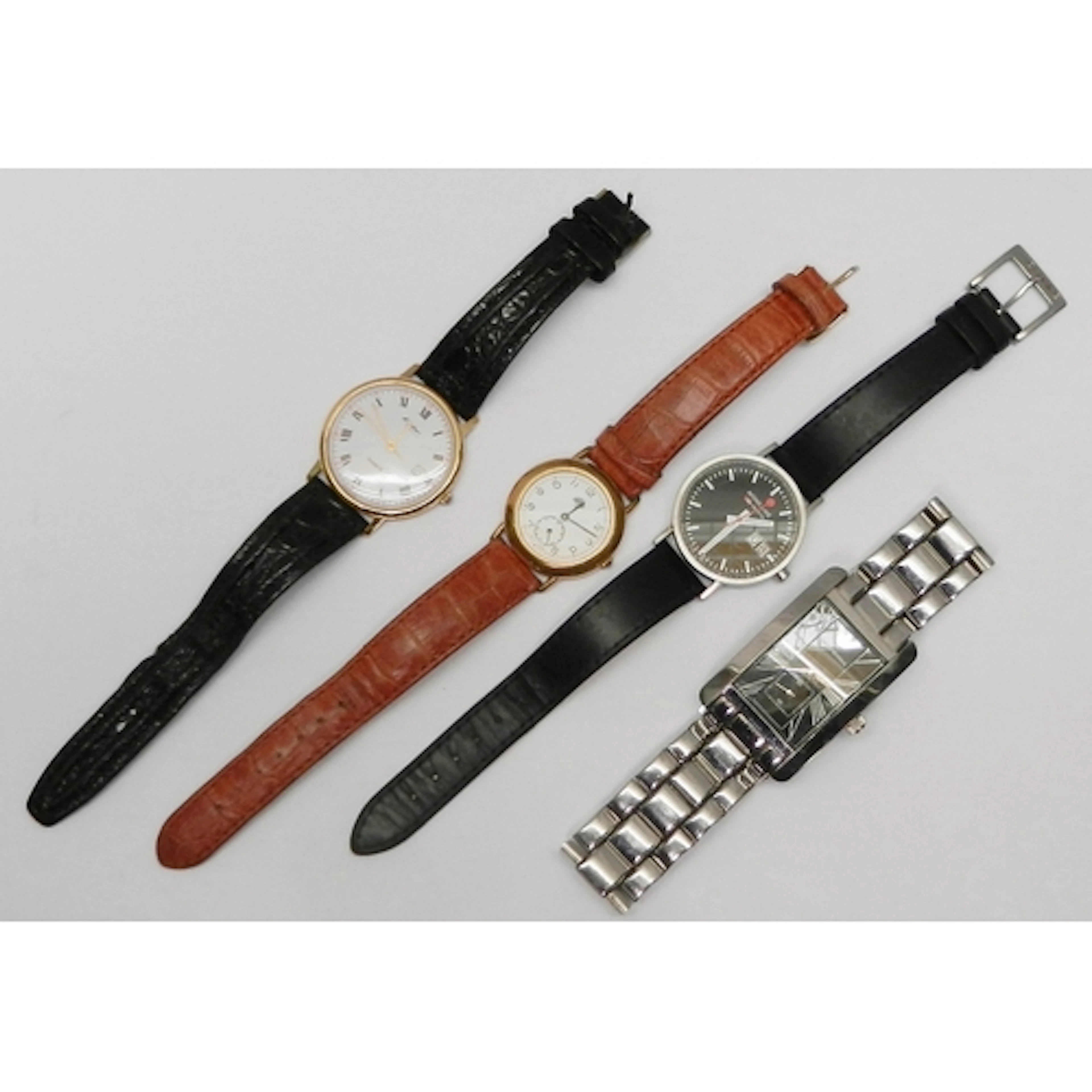 A Mondaine quartz Swiss Railways watch comprising a black di...