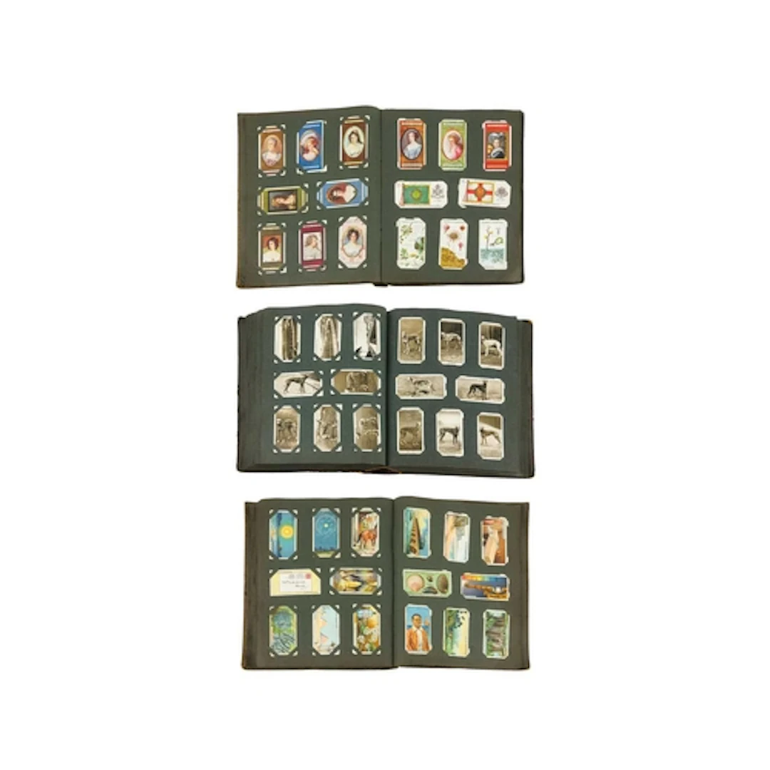 Three Cigarette Card Albums. Three albums containing various...