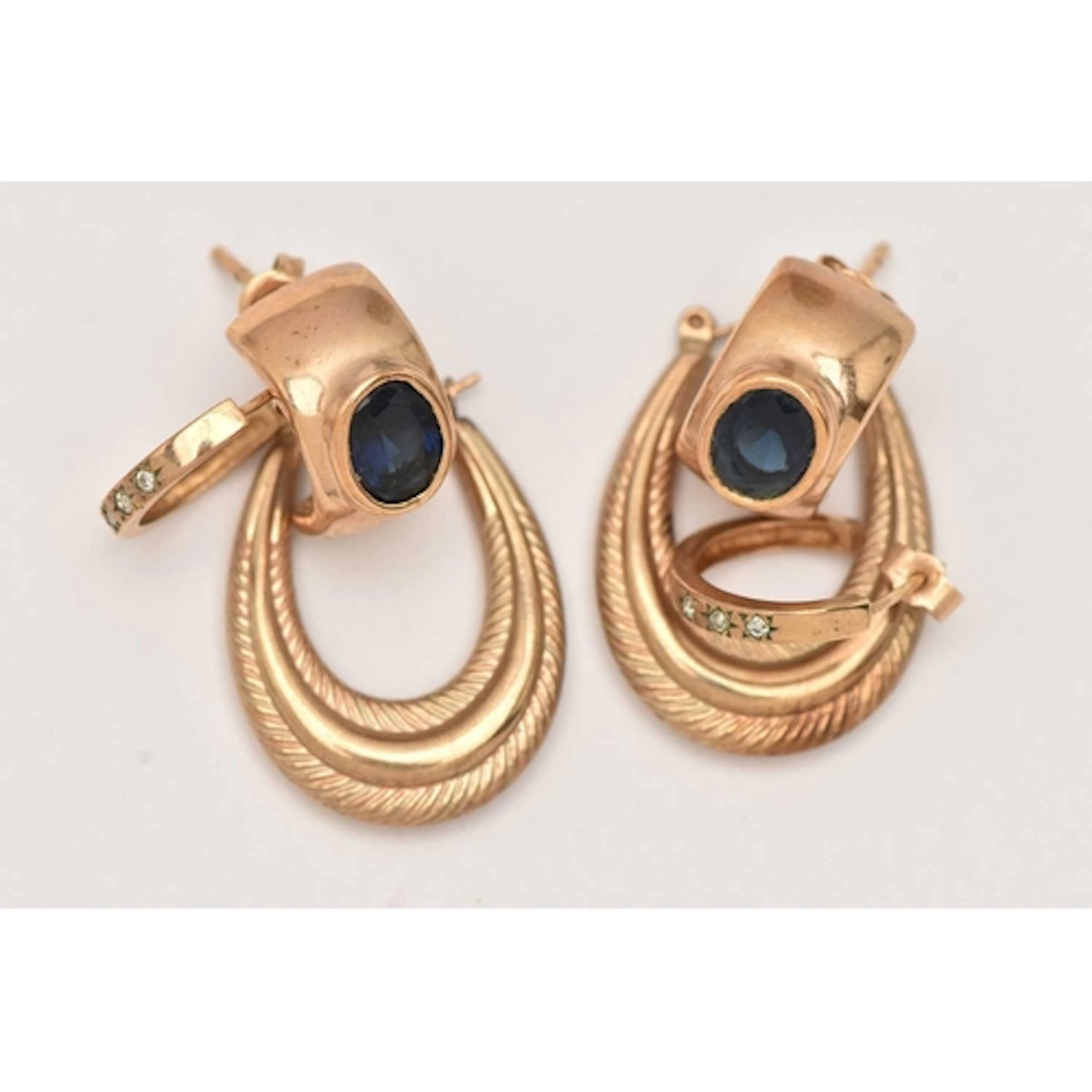 THREE PAIRS OF HOOP EARRINGS, to include a wide pair of yell...