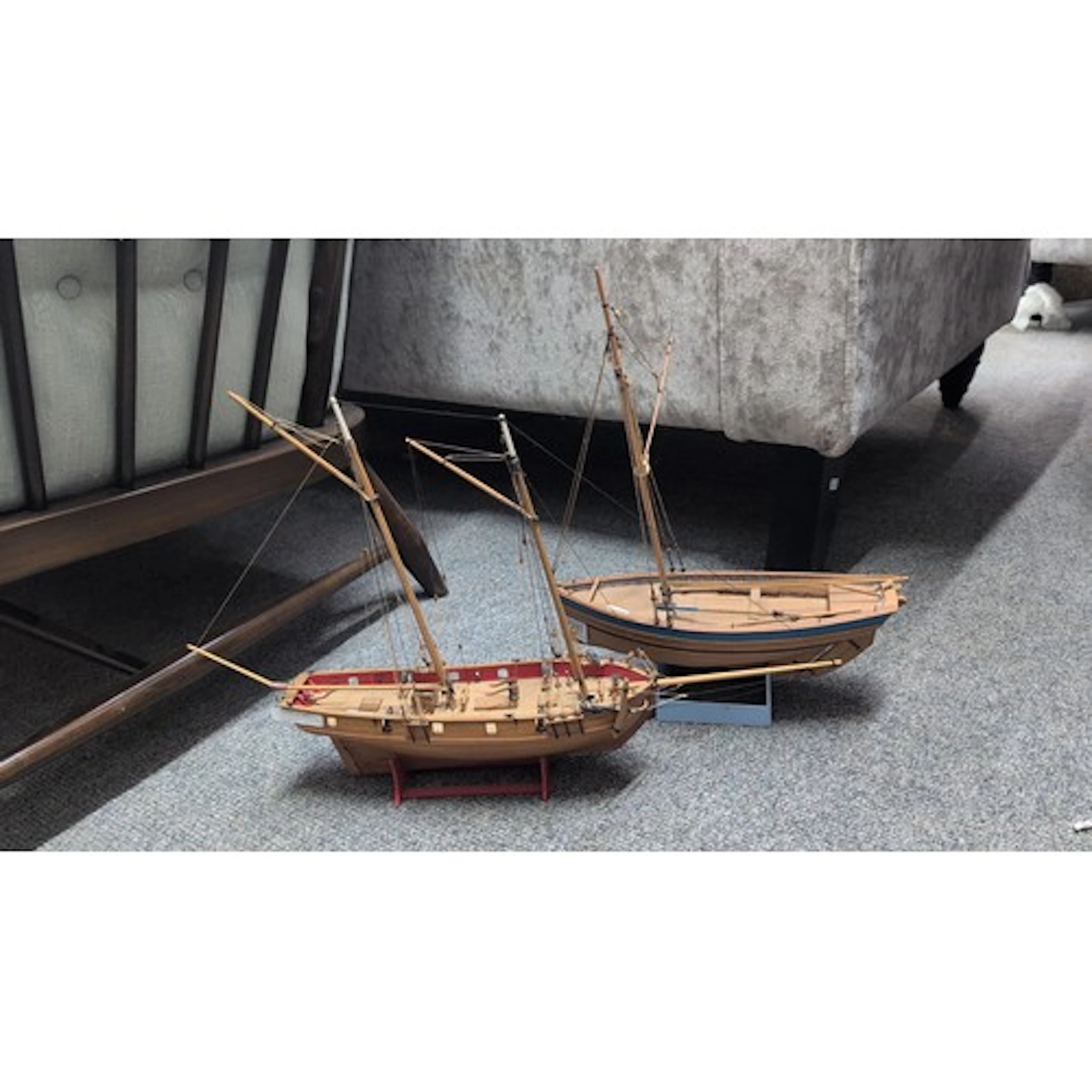 2 x wooden model sailing vessels, rigged with masts and stan...